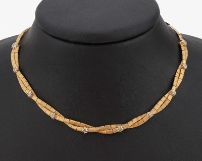 Image 18 kt gold diamond necklace , YG 750/000, struct., middle part braided, with 10 8/8- ...