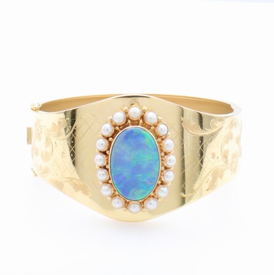 Image Armreif mit Opal und Perlen, GG 750/000, ovaler Opal umfasst v. kleinen Perlen, floral ...
