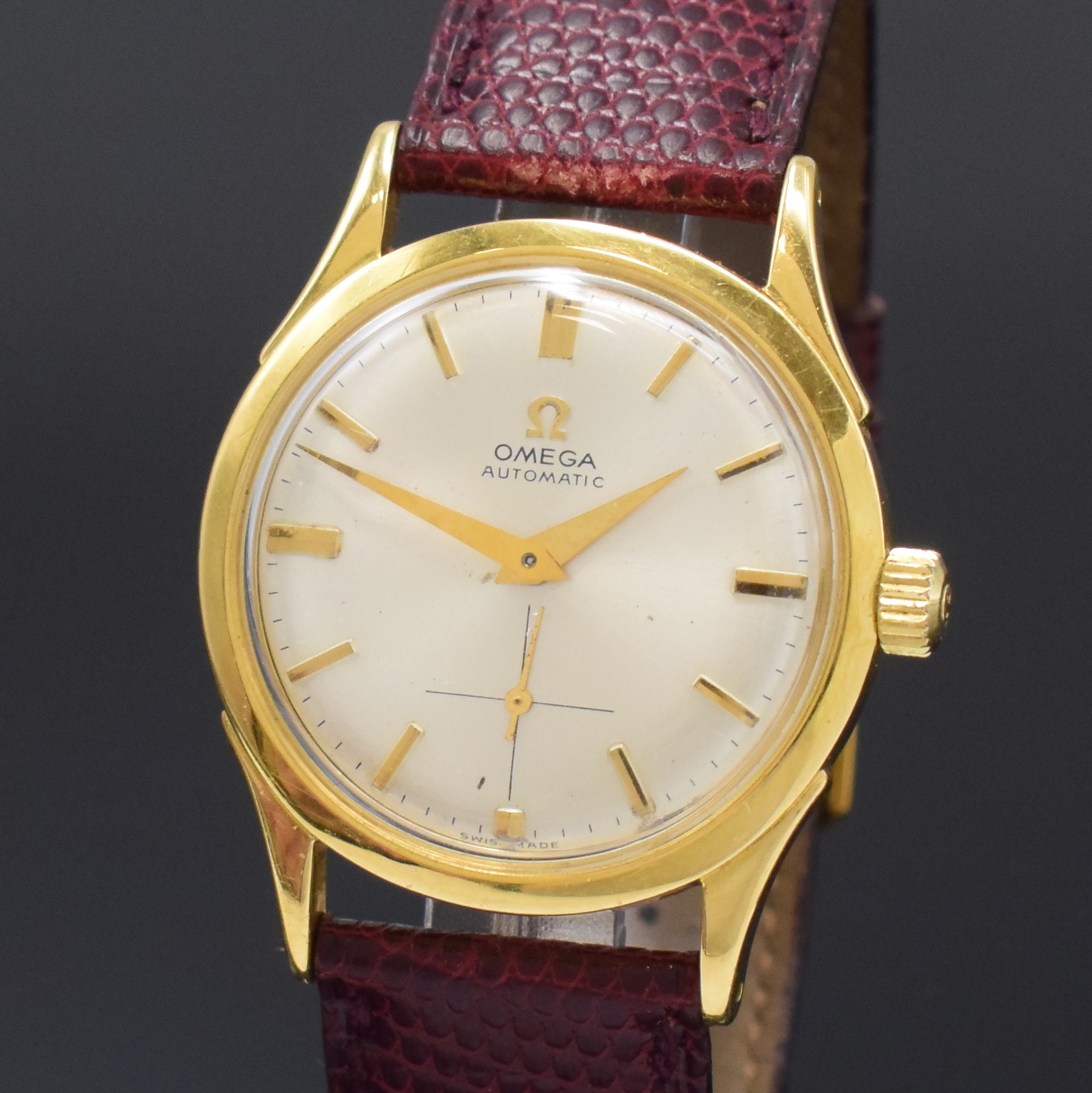 Detail a: OMEGA Herrenarmbanduhr mit Hammerautomatik in GG 750/000 Referenz 2581, Schweiz um 1950, Automatik, dell. Boden verschr., silb. späteres orig. ...