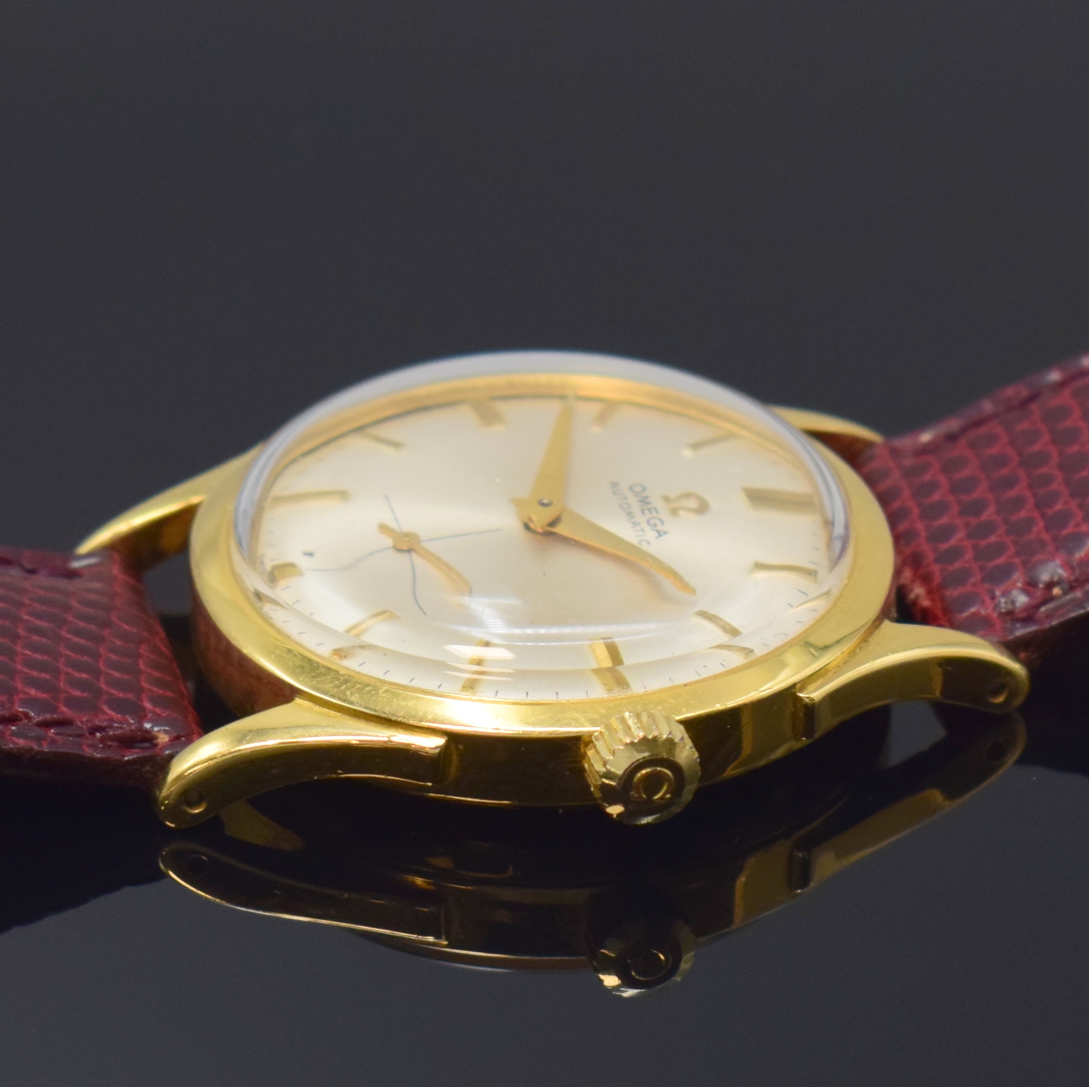 Detail b: OMEGA Herrenarmbanduhr mit Hammerautomatik in GG 750/000 Referenz 2581, Schweiz um 1950, Automatik, dell. Boden verschr., silb. späteres orig. ...
