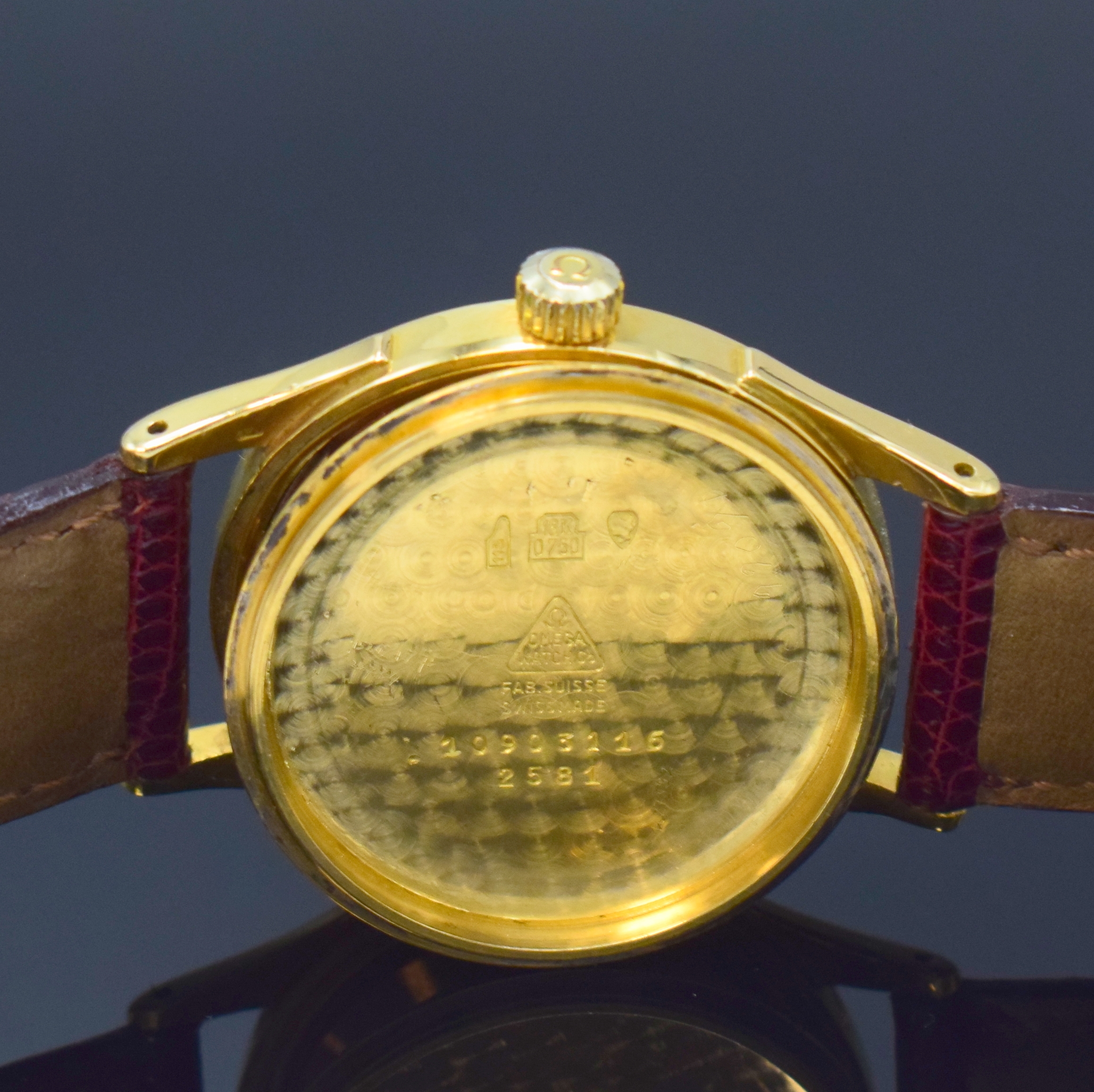 Detail e: OMEGA Herrenarmbanduhr mit Hammerautomatik in GG 750/000 Referenz 2581, Schweiz um 1950, Automatik, dell. Boden verschr., silb. späteres orig. ...