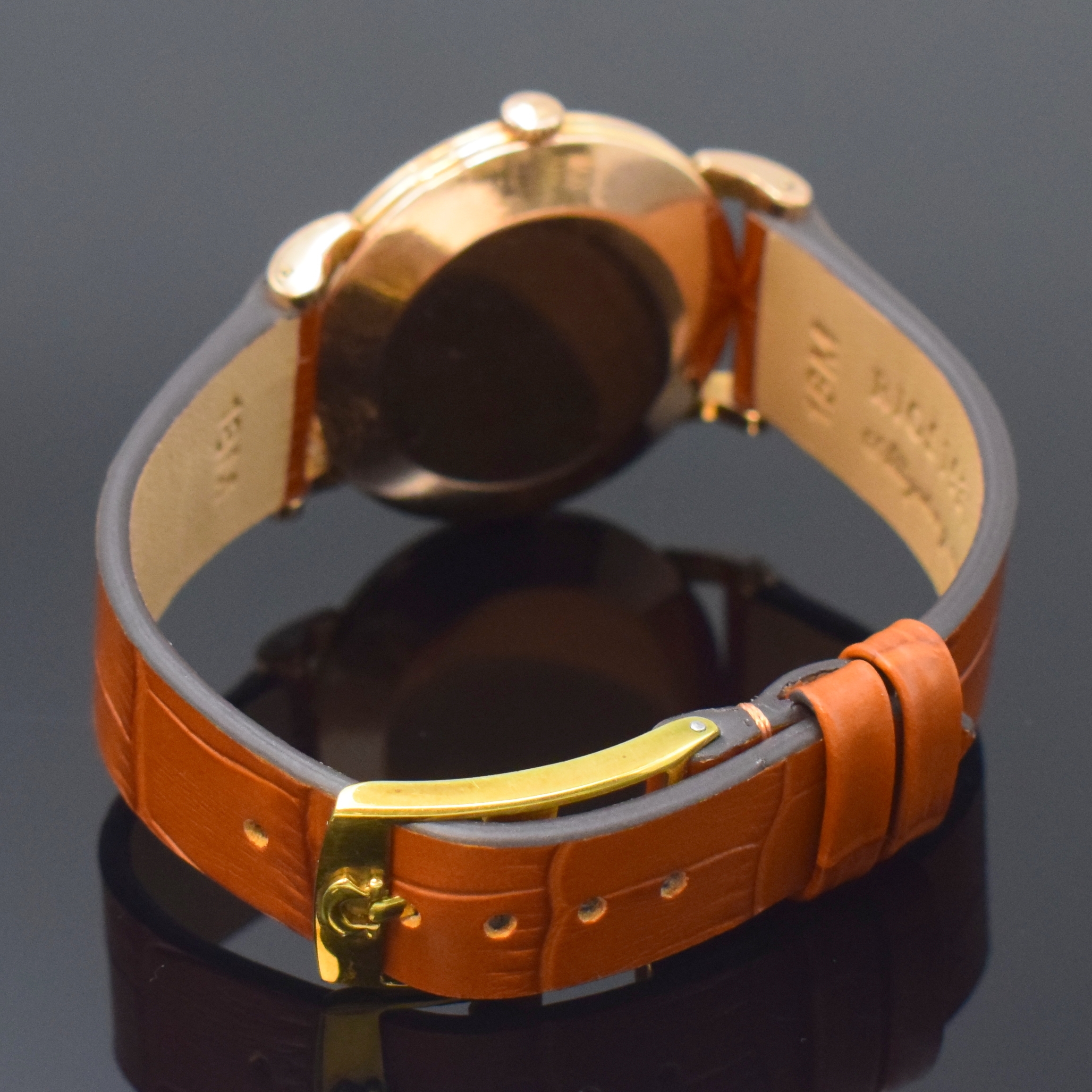 Detail b: OMEGA Herrenarmbanduhr 80 Micron vergoldet mit Hammerautomatik Referenz 2398-1, Schweiz um 1950, Automatik, neutr. Lederband m. Omega Schliesse, ...