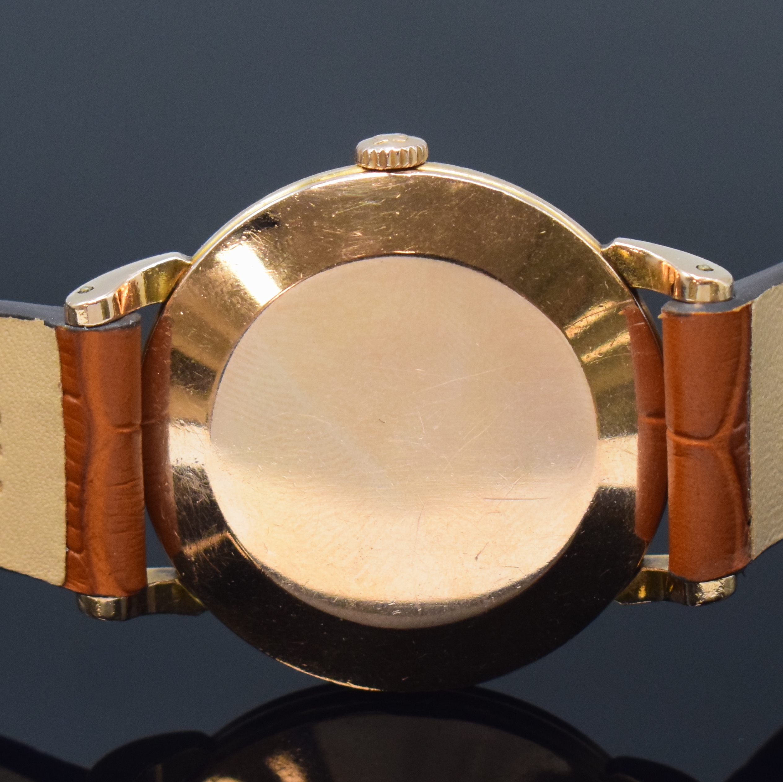 Detail d: OMEGA Herrenarmbanduhr 80 Micron vergoldet mit Hammerautomatik Referenz 2398-1, Schweiz um 1950, Automatik, neutr. Lederband m. Omega Schliesse, ...