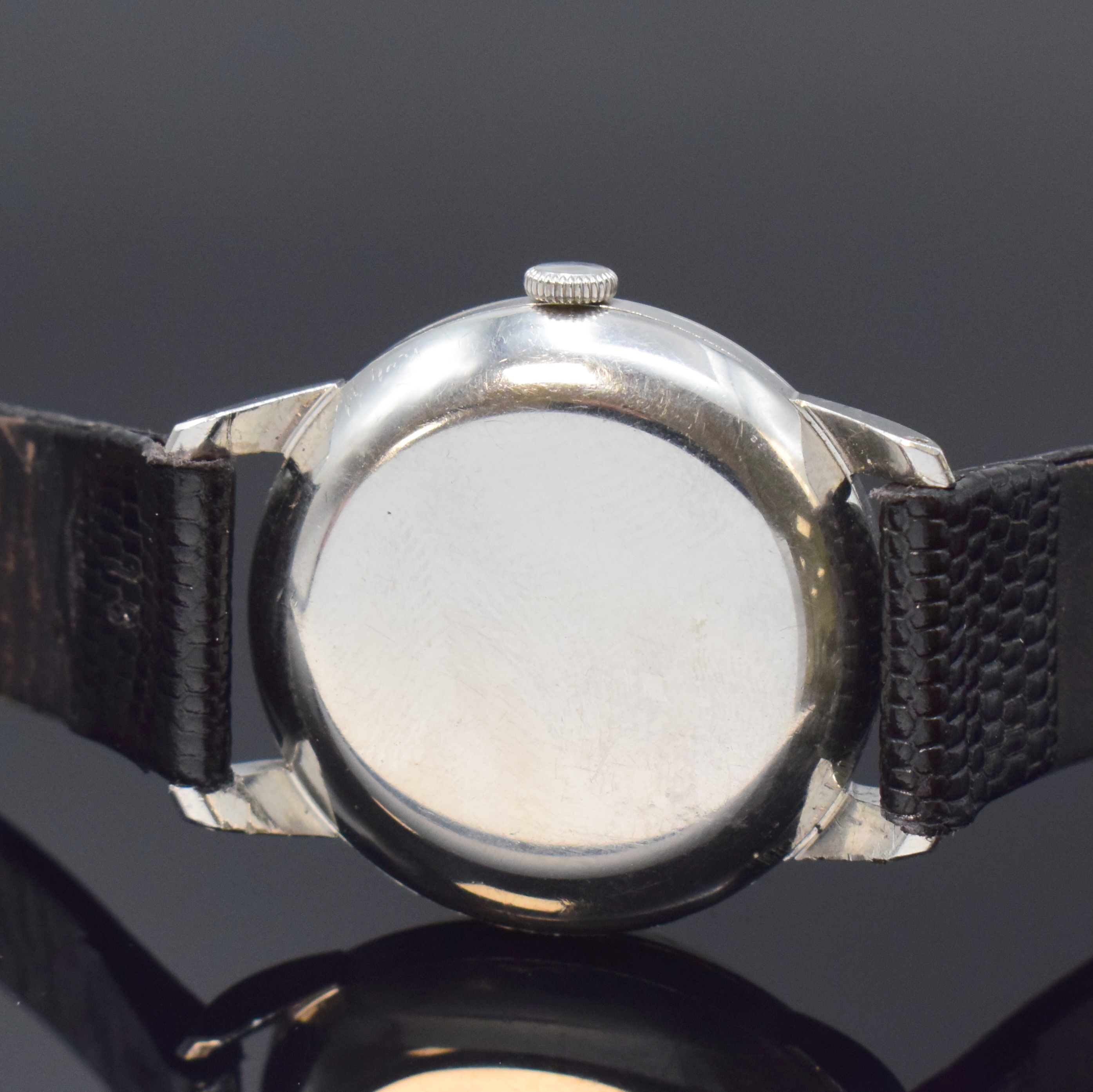 Detail c: IWC Herrenarmbanduhr Kaliber 85 in Stahl, Schweiz um 1951, Automatik, Boden u. Glasrand aufgedr., silb. Zifferbl. pat./fl., Leuchtind. u. Zahlen, ...