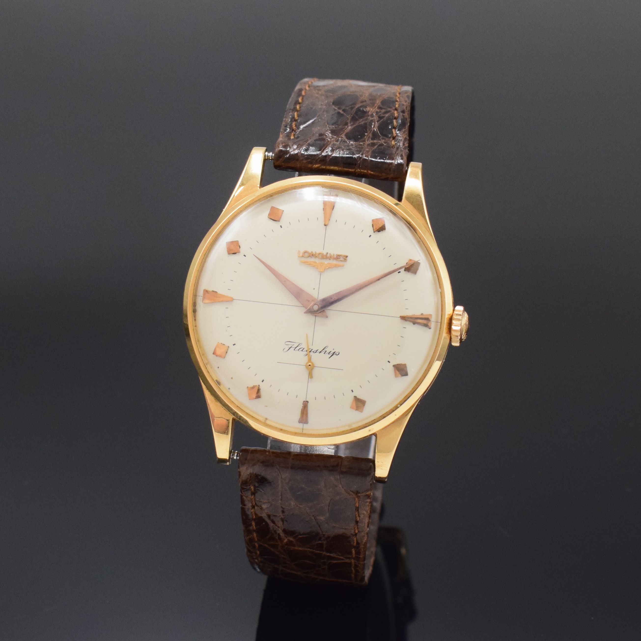 LONGINES Flagship Herrenarmbanduhr in RoseG 750/000, Schweiz um 1960, Handaufzug, Boden (l. dell.) u. Glasrand aufgedr., orig. Krone, vers. Zifferbl. ...