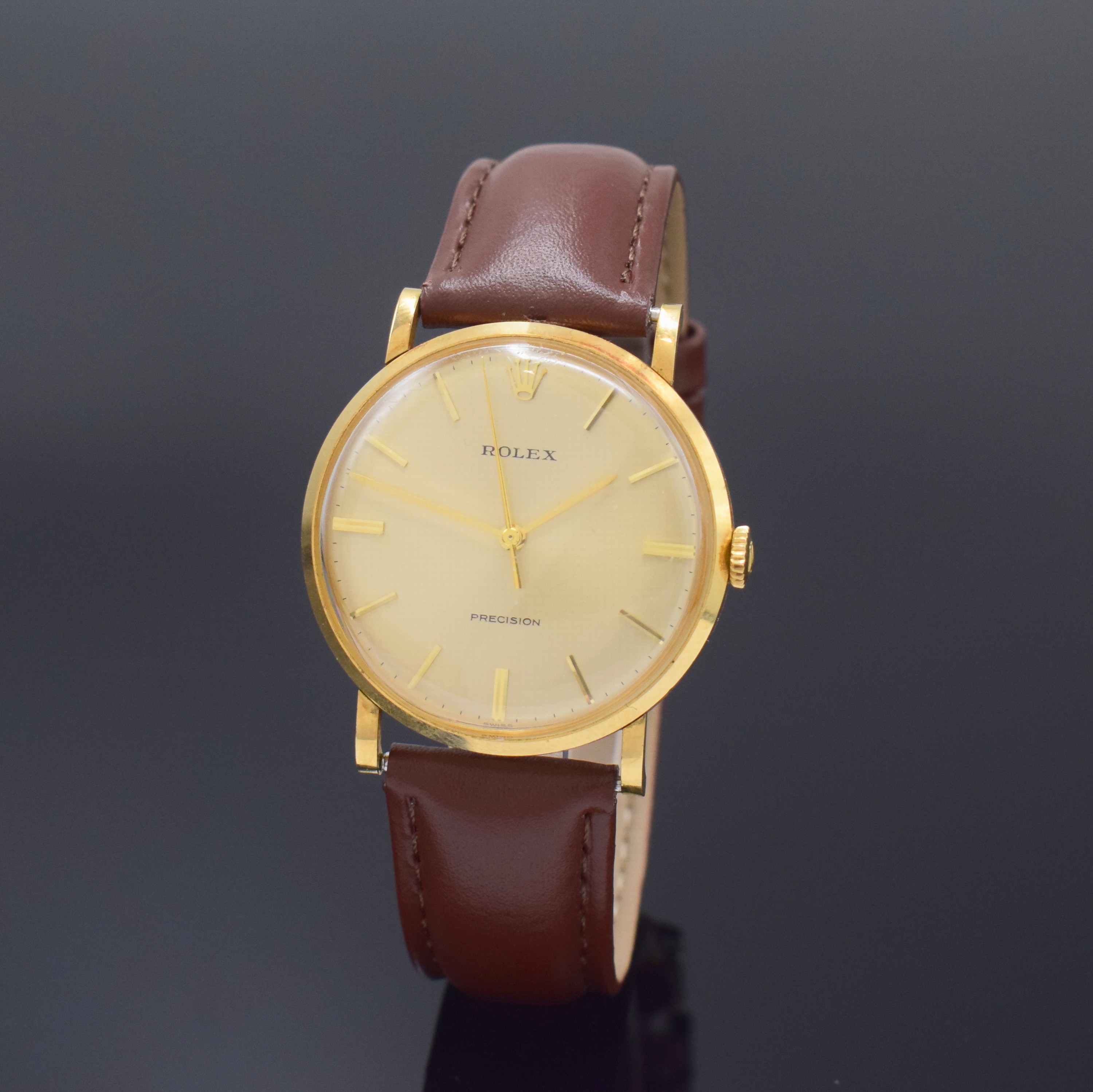 ROLEX Precision Herrenarmbanduhr Referenz 9659 in GG 750/000, Schweiz um 1960, Handaufzug, Boden u. Glasrand aufgedr., neutr. Lederband inkl. orig. ...