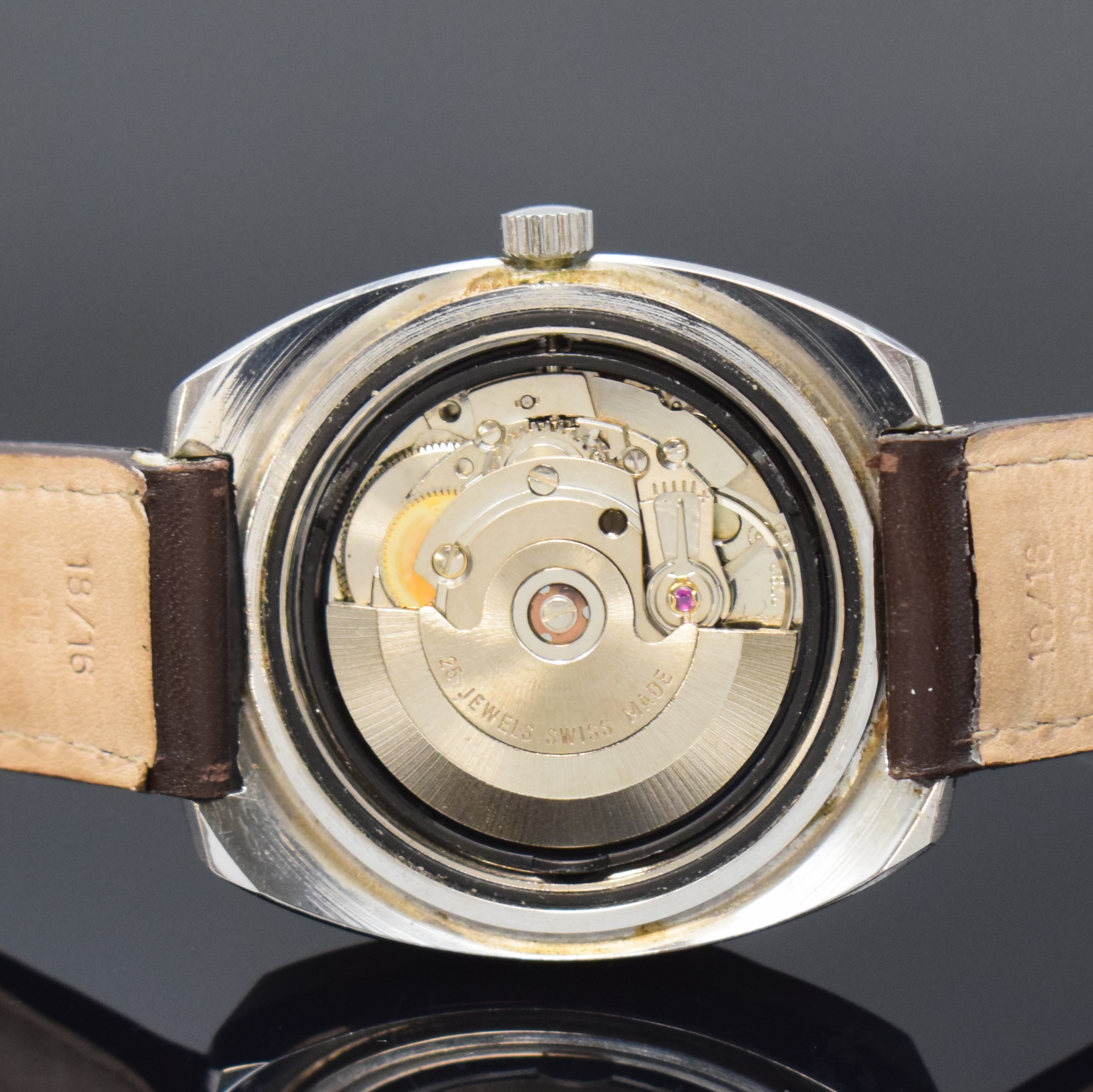 Detail d: BWC Herrenarmbanduhr in Stahl, Schweiz um 1970, Automatik, verschr. Geh.., Mineralglas, braunes Fum?-Zifferbl., silb. Indizes u. Zeiger, Datum b. 6, ...