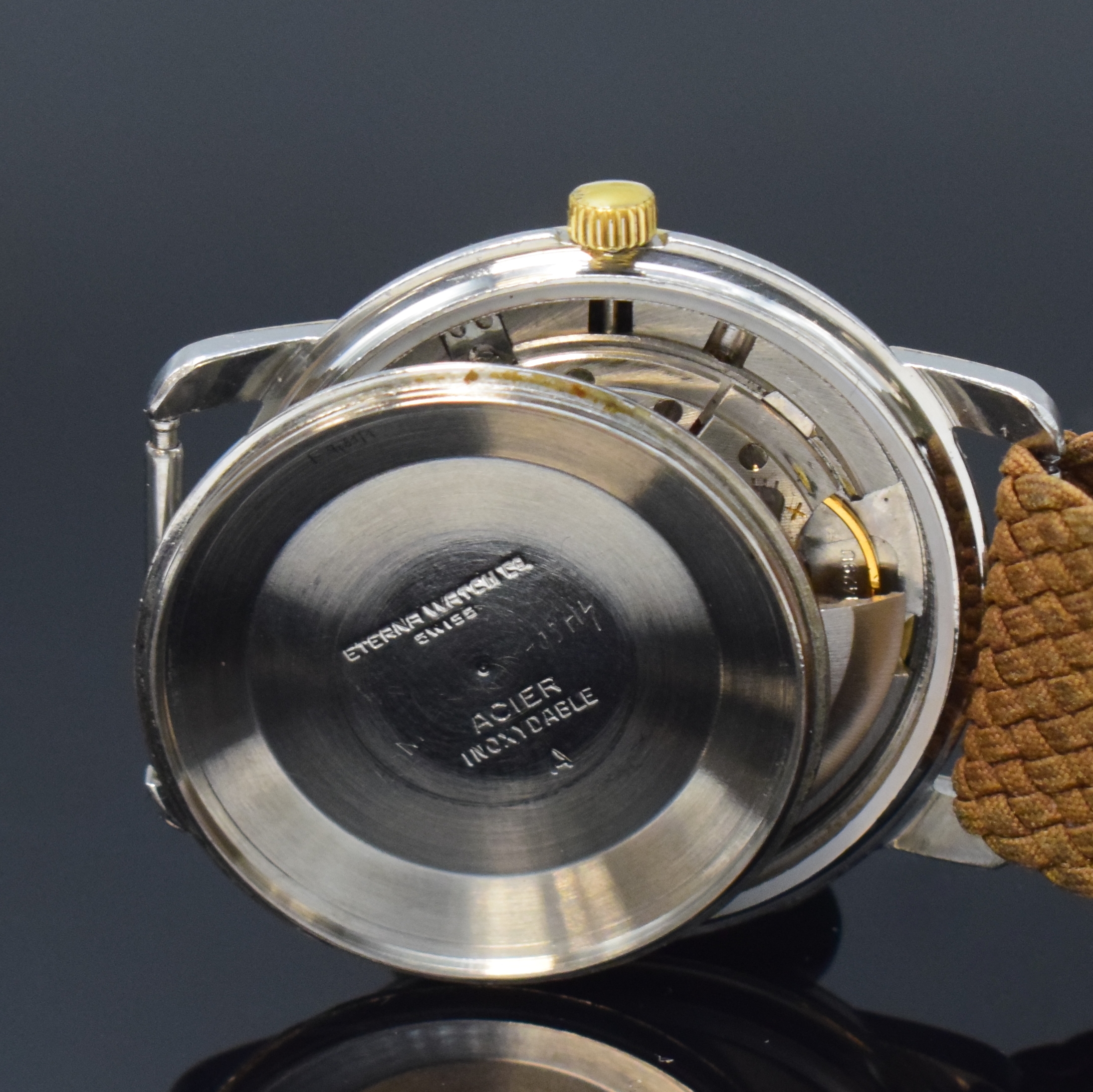 Detail e: ETERNA-MATIC Centenaire Armbanduhr in Stahl/Gold, Schweiz um 1960, Automatik, verschr. Geh. m. Goldhaube, silb. Zifferbl. pat./fl., gold. Indizes u. ...