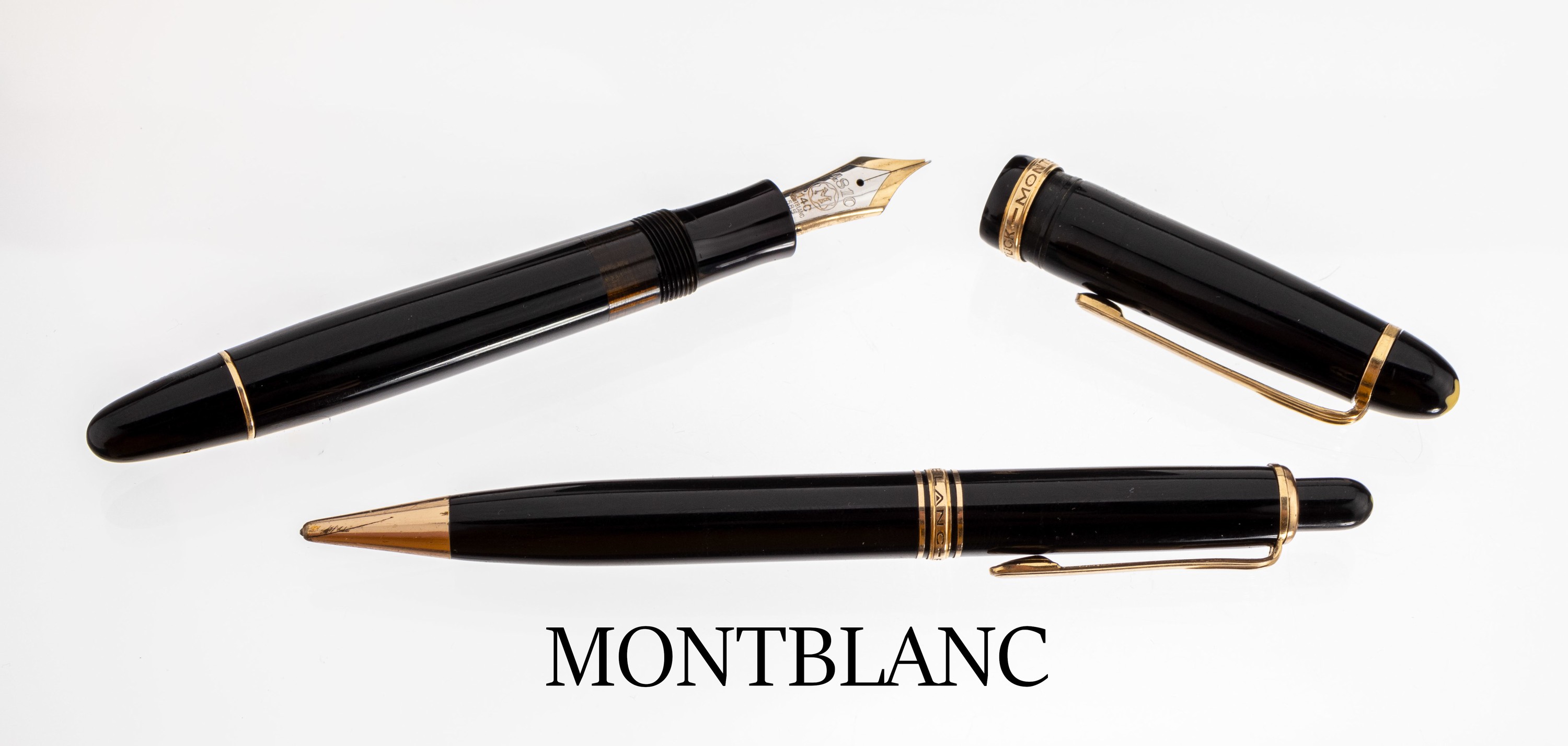 MONTBLANC Set, best. aus: 1 Füller und 1 Druckbleistift, Korpus schwarzer Edelharz, Monturen Metall verg., Feder GG/WG 585/000, 1 Zierring fehlend, ...