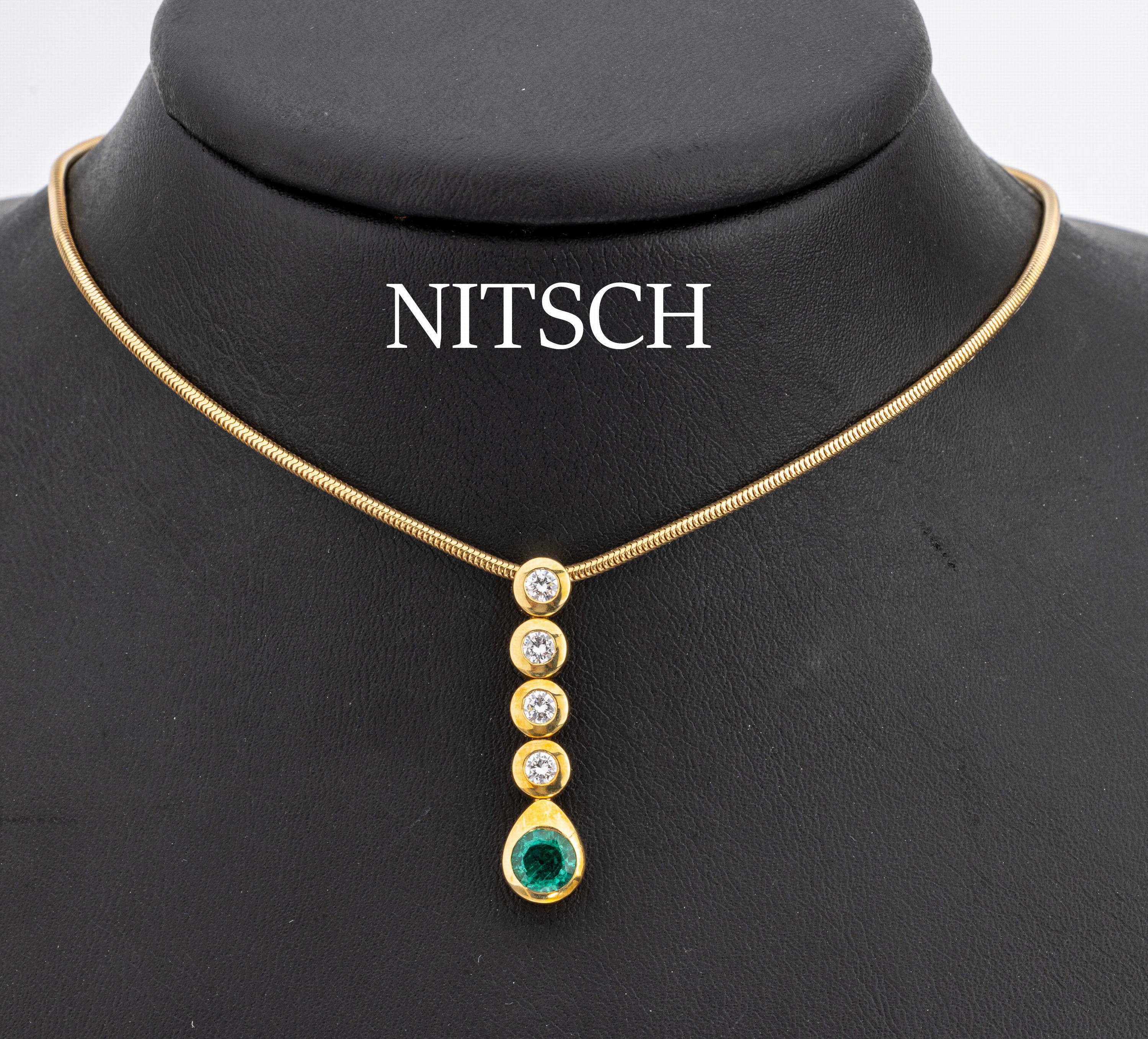 18 kt Gold Smaragd-Brillant-Anhänger, GG 750/000, rundfacett. Smaragd ca. 0.78 ct, 4 Brillanten zus. ca. 0.40 ct feines Weiss/lupenrein, ...