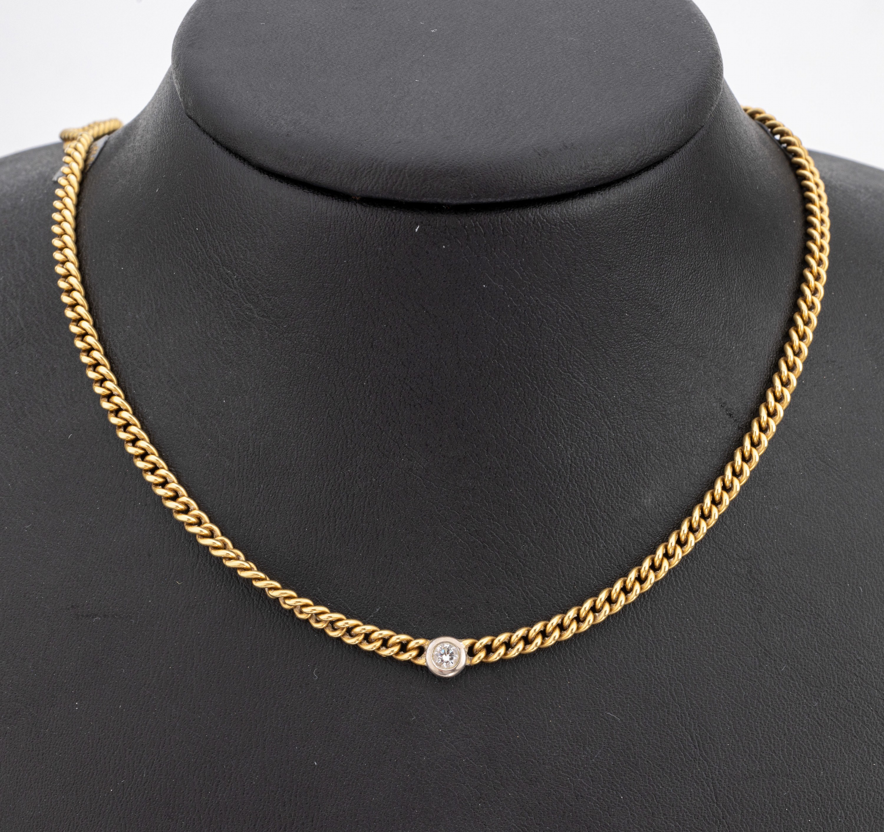 18 kt Gold Brillant-Collier, GG/WG 750/000,ein in WG gefasster Brillant ca. 0.17 ct feines Weiss/lr, L. ca. 41 cm, Kastenschloss mit ...