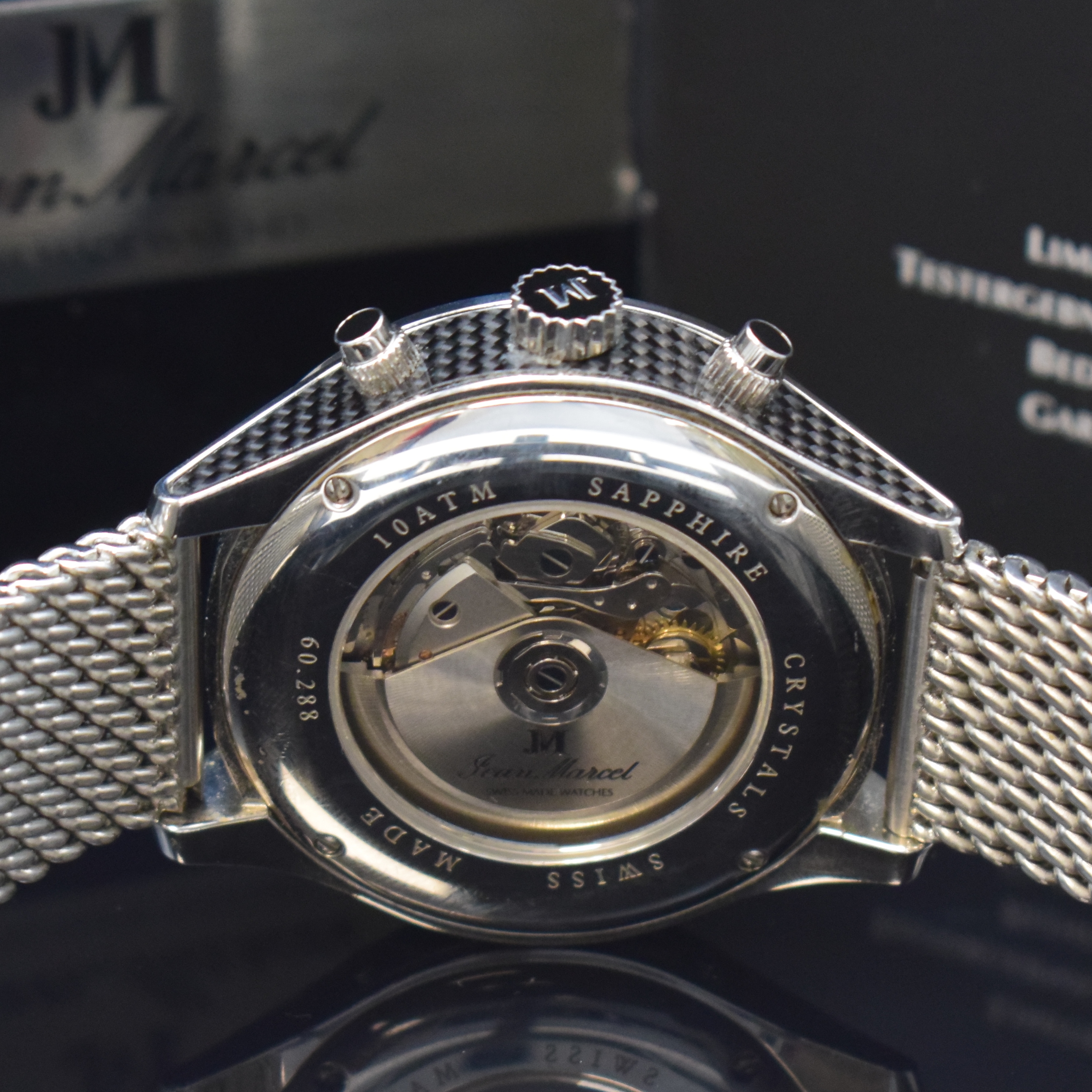 Detail e: JEAN MARCEL Mythos auf 100 Stück limitierter Armbandchronograph in Stahl, Schweiz um 2020, Automatik, orig. Stahlband m. dopp. Faltschl., beids. ...