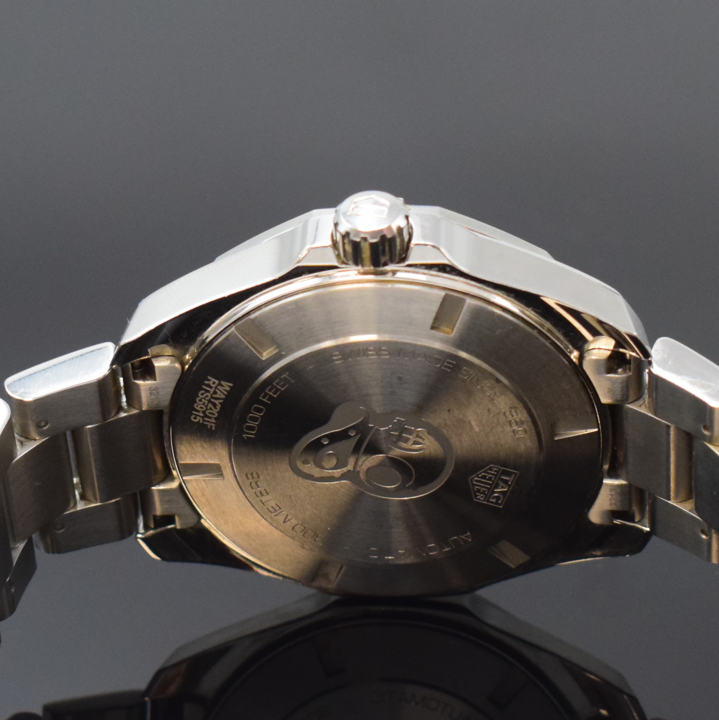 Detail d: TAG HEUER Aquaracer GMT Calibre 7 Herrenarmbanduhr in Stahl Referenz WAY201F, Schweiz um 2020, Automatik, orig. Gliederband inkl. Faltschl., Boden u. ...