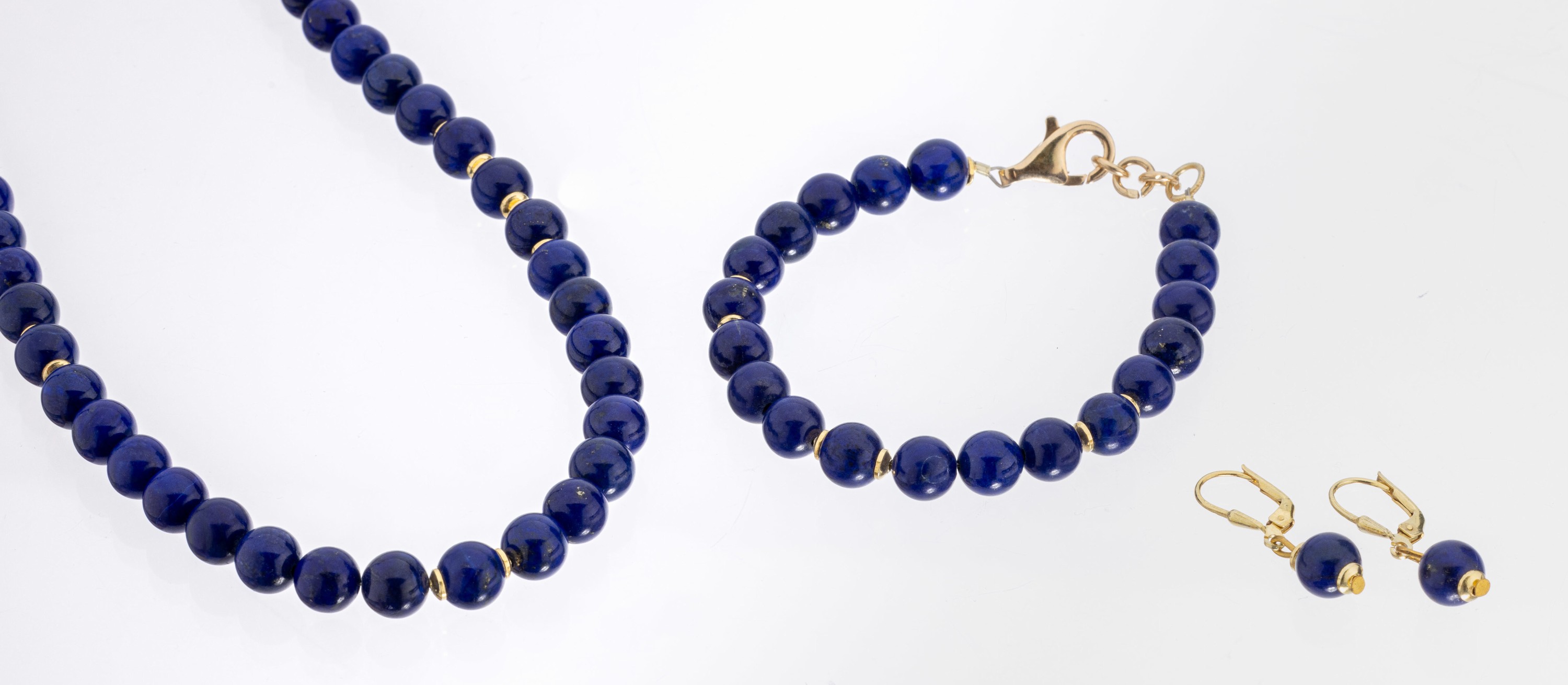 Lapislazuli-Schmuckset, 925er Silber verg.,Lapislazuli-Kugeln, D. ca. 8.2 mm, best. aus: 1 Collier, L. ca. 50 cm, 1 Armband, L. ca. 19 cm, und 1 ...