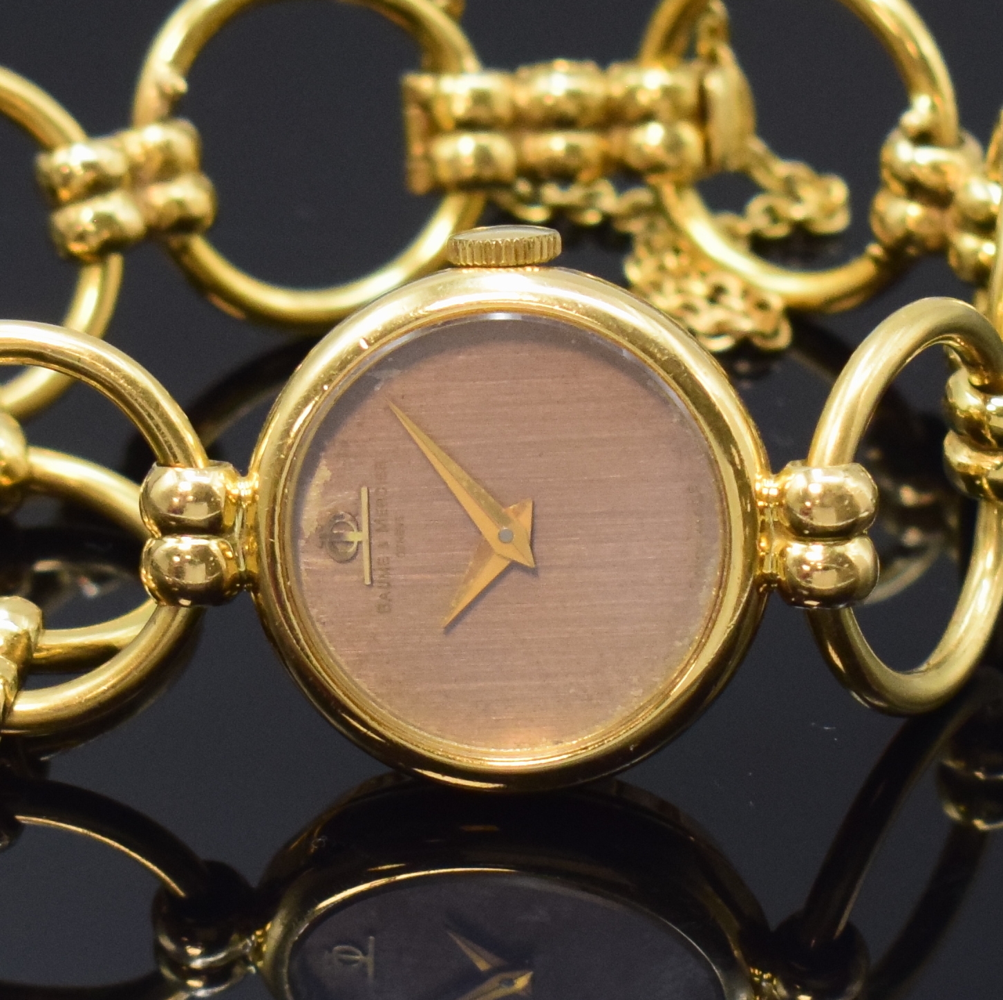 Detail a: BAUME & MERCIER ausgefallene Damenarmbanduhr in GG 750/000, Schweiz um 1970, Handaufzug, 2-tlg. Geh., Boden aufgedr., Band aus 7 beweglichen ...