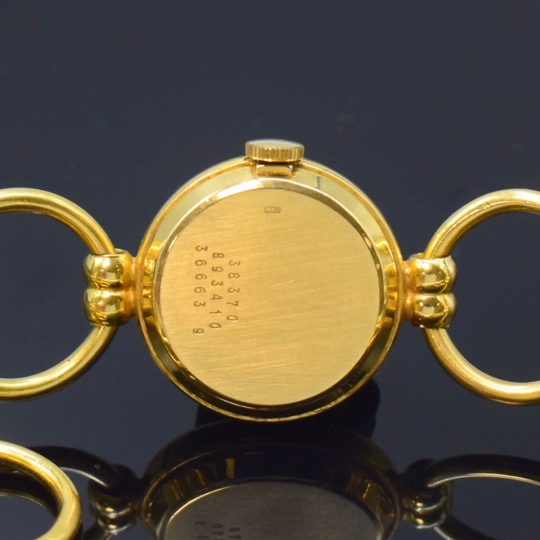 Detail c: BAUME & MERCIER ausgefallene Damenarmbanduhr in GG 750/000, Schweiz um 1970, Handaufzug, 2-tlg. Geh., Boden aufgedr., Band aus 7 beweglichen ...