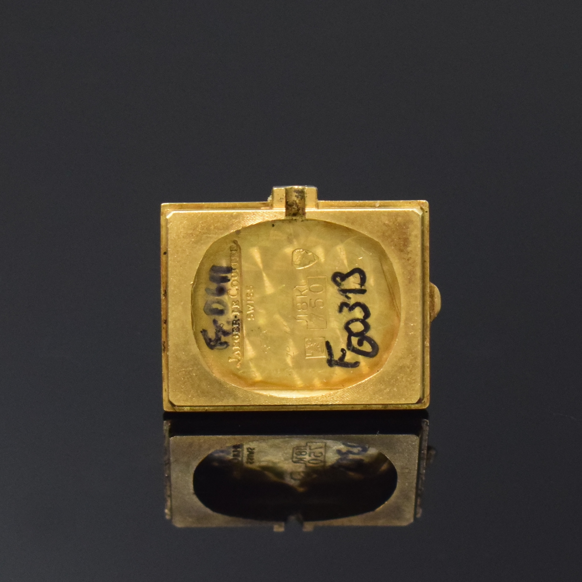 Detail e: Jaeger-LeCoultre Damenarmbanduhr Referenz 6128 in GG 750/000, Schweiz um 1965, Handaufzug, Tank-förmiges Geh., Boden aufgedr., schwarzes Zifferbl., ...