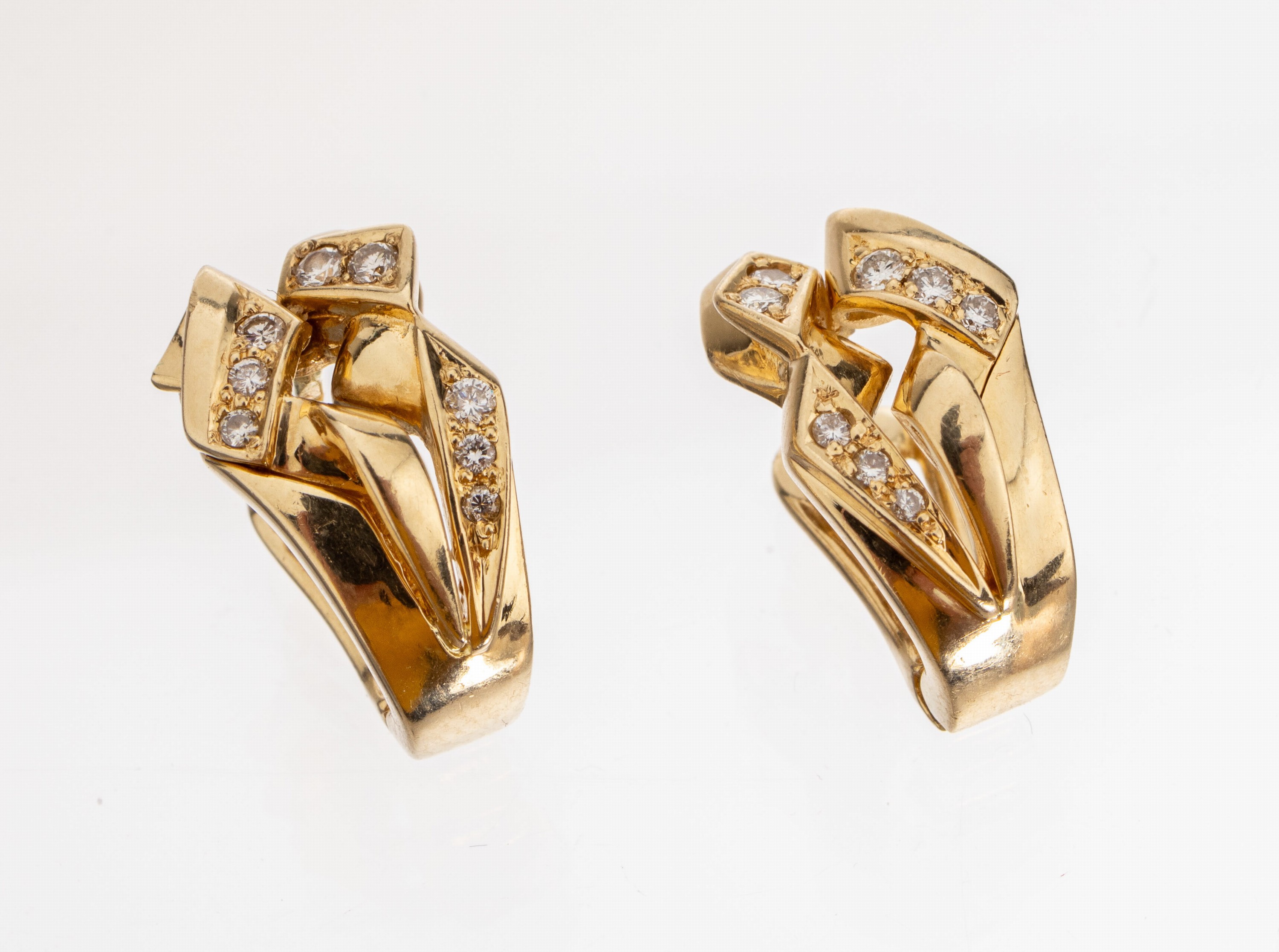 Paar 14 kt Gold Brillant-Ohrstecker, GG 585/000, außergewöhnliche Gestaltung, 16 Brillanten zus. ca. 0.25 ct Weiß/si, ca. 8.0 g, Clipbrisur
