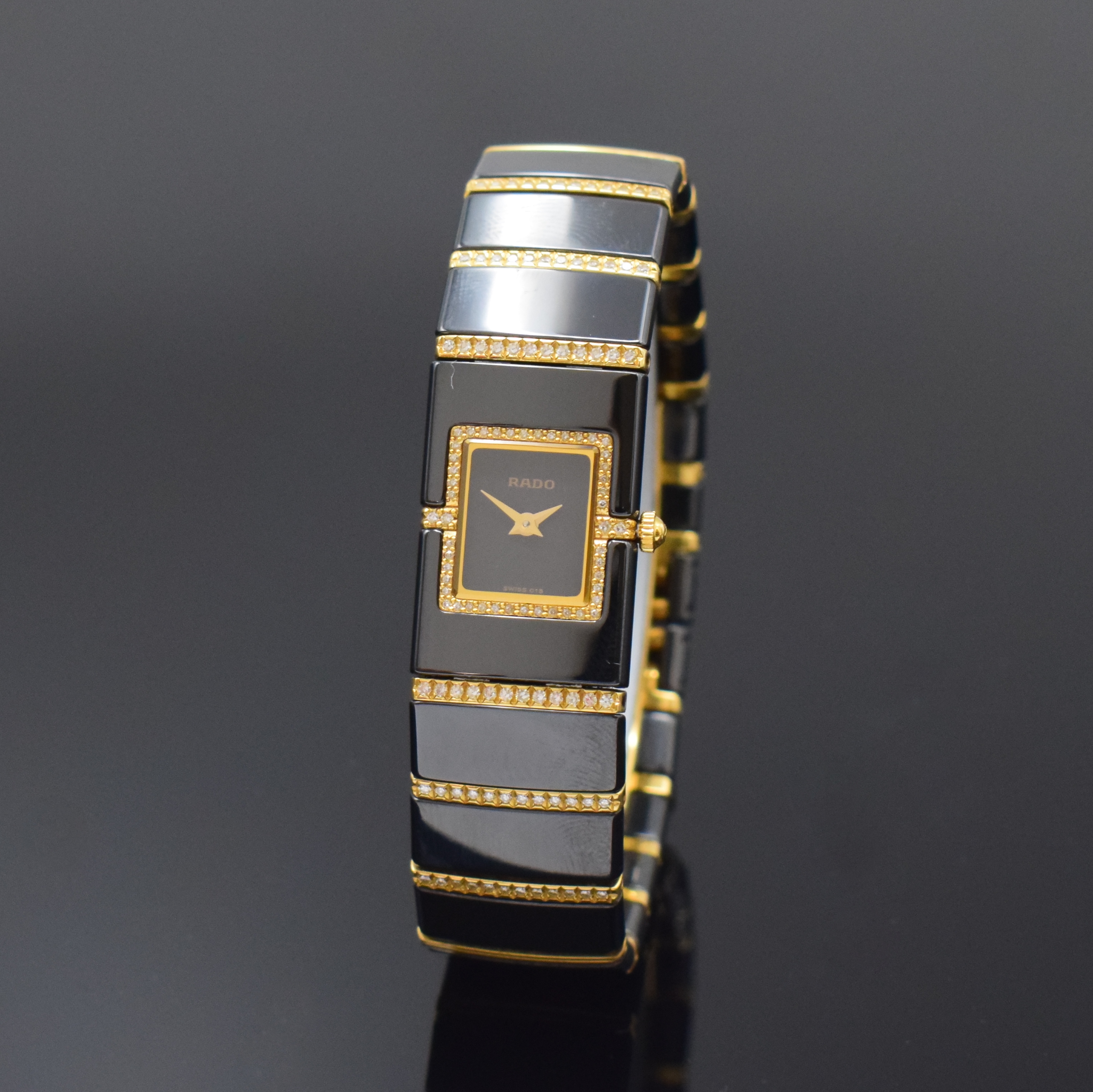 RADO Diastar Diaqueen Damenarmbanduhr mit Diamanten Referenz 963.04.10.3, Schweiz um 2000, quarz, Keramik/GG 750/000 kombiniert, orig. Gliederband m. ...