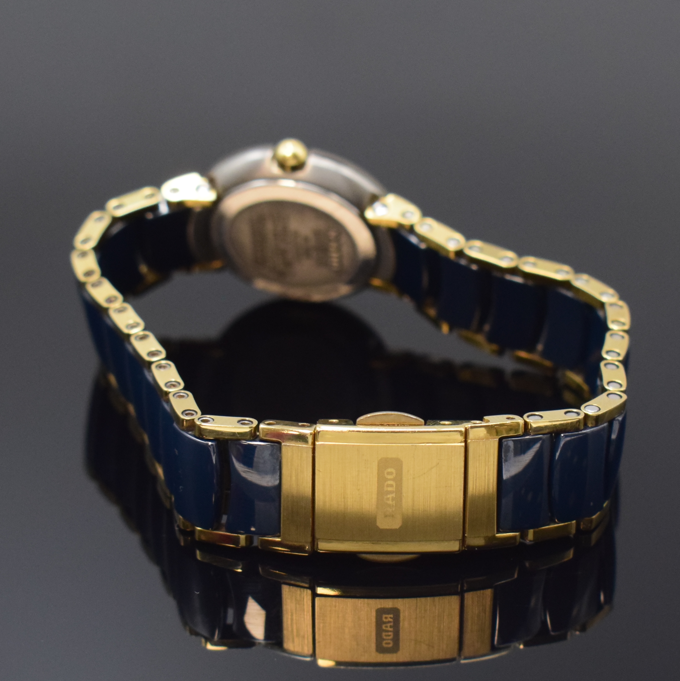 Detail b: RADO Diastar Damenarmbanduhr Referenz 153.0360.3, Schweiz um 2010, quarz, Edelstahlgeh. inkl. Keramikband m. dopp. Faltschl. in Titan, Boden ...