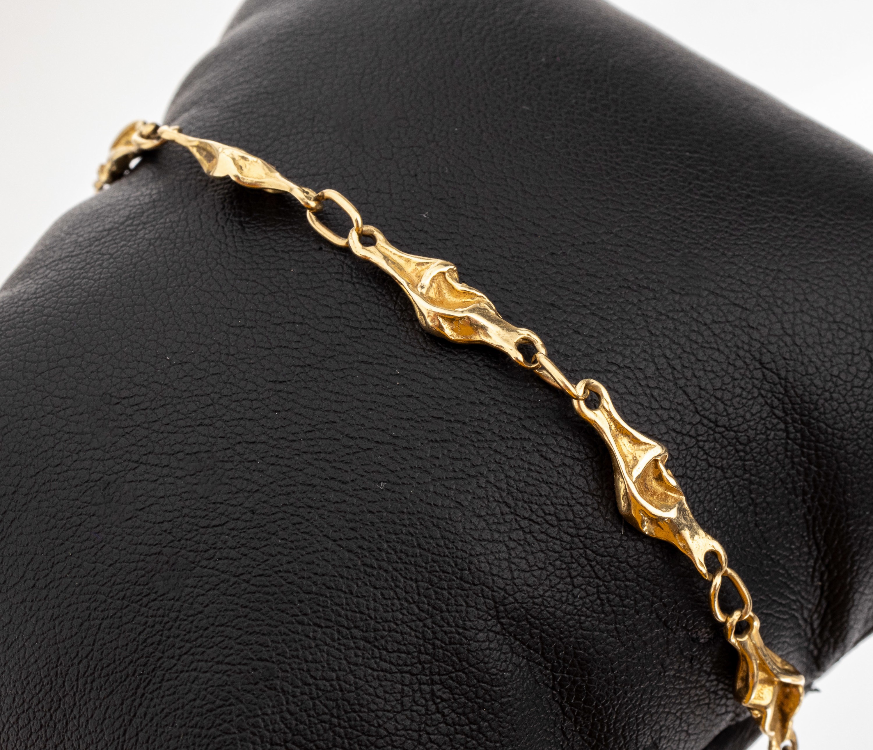 14 kt Gold Armband, GG 585/000, abstrakte Glieder, L. ca. 20 cm, ca. 7.2 g