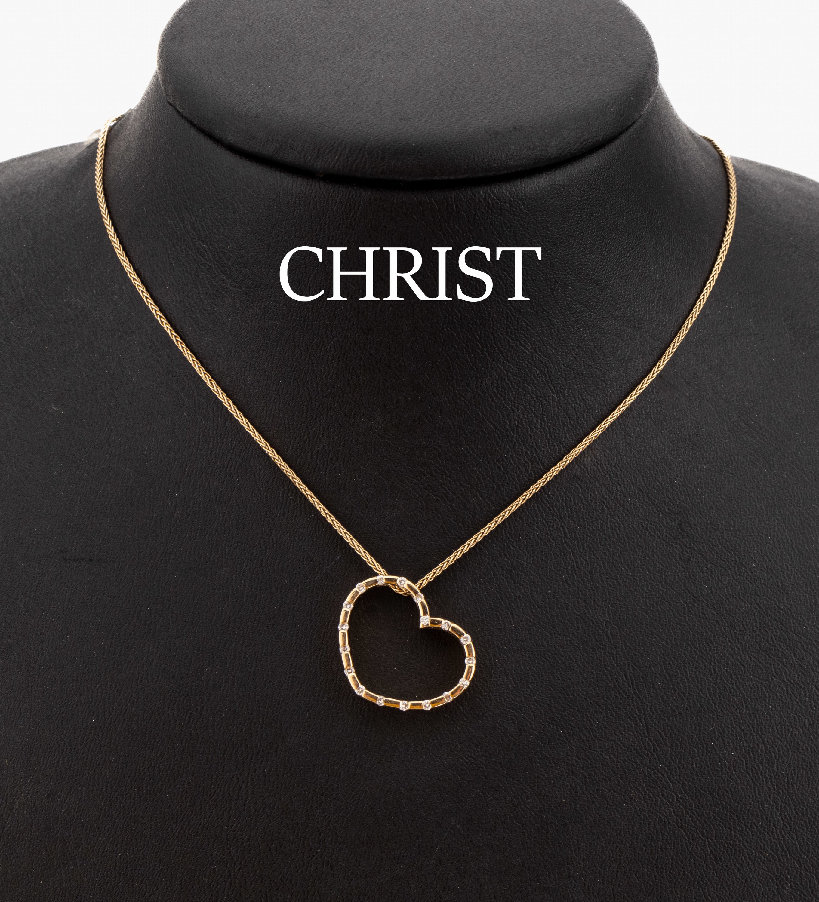 14 kt Gold CHRIST Brillant Anhänger "Herz", GG 585/000, 18 Brillanten zus. ca. 0.12 ct Weiss/si, an Kette, L. ca. 46 cm, Karabiner- ...