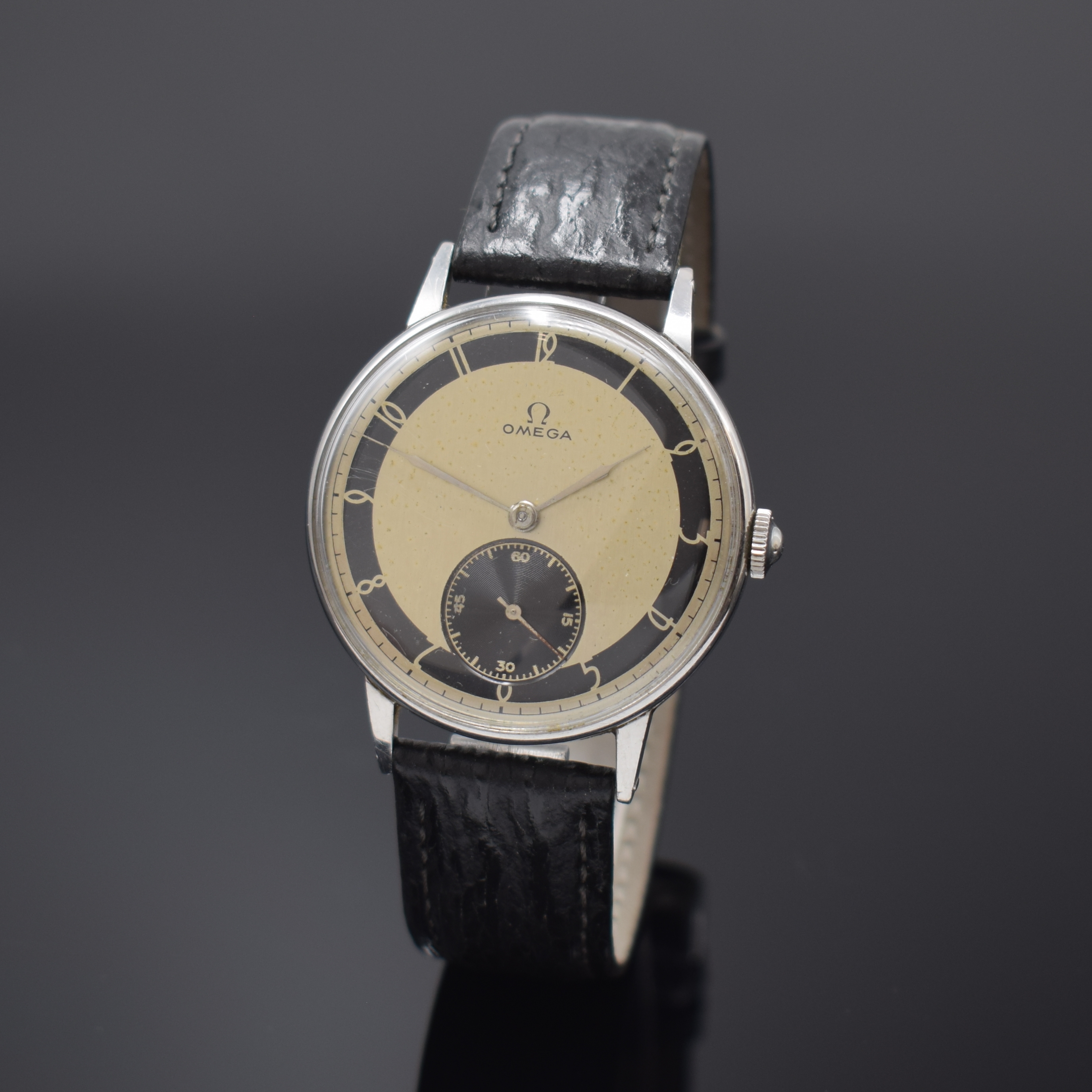 OMEGA Herrenarmbanduhr Referenz 2319 in Stahl, Schweiz um 1940, Handaufzug, unpoliertes 3-tlg. Geh., Boden u. Glasrand aufgedr., orig. Krone, silb. ...