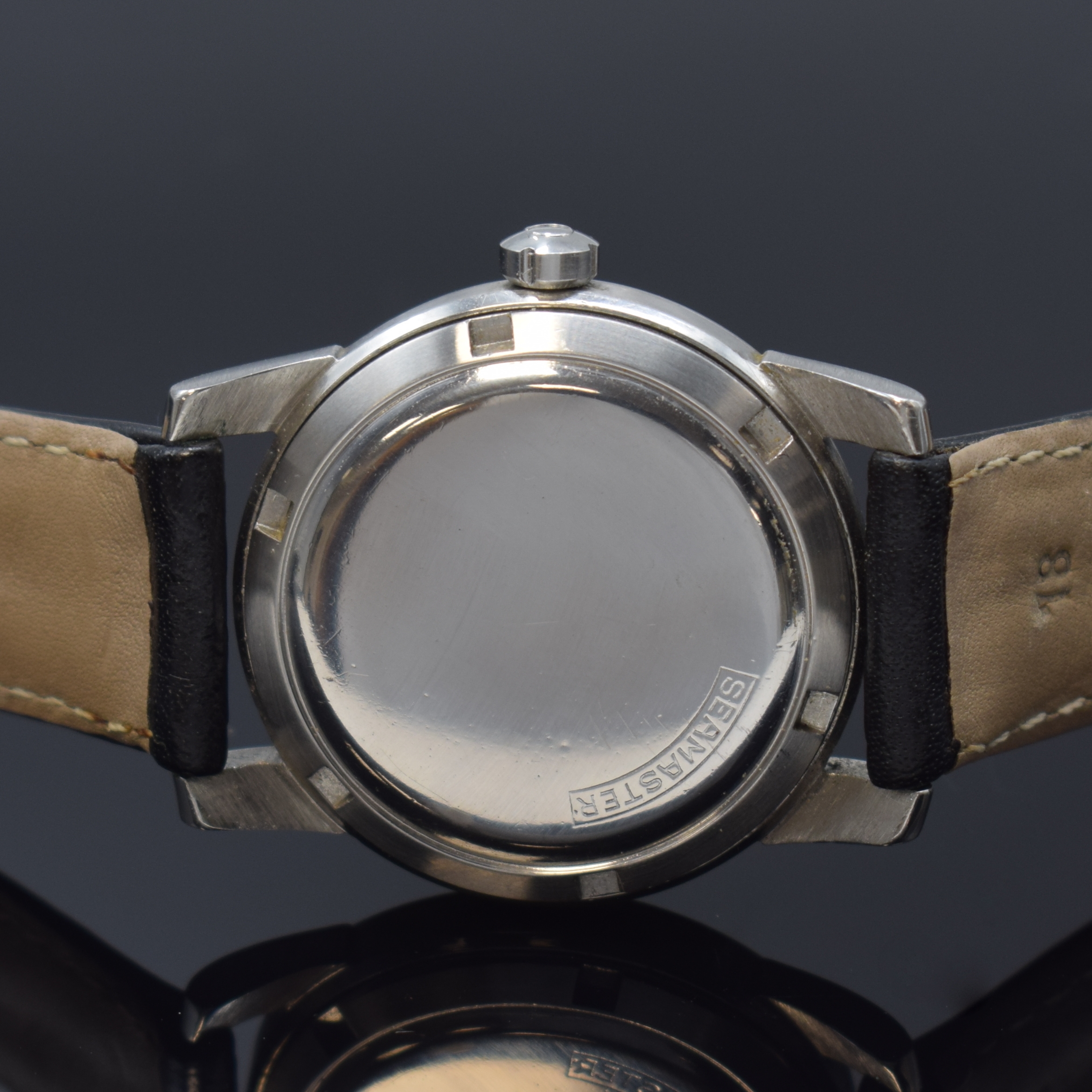 Detail e: OMEGA Seamaster Herrenarmbanduhr Referenz 2575-6 SC in Stahl, Schweiz um 1952, Hammerautomatik, verschr. Geh., orig. Krone, silb. Zifferbl. rest., ...