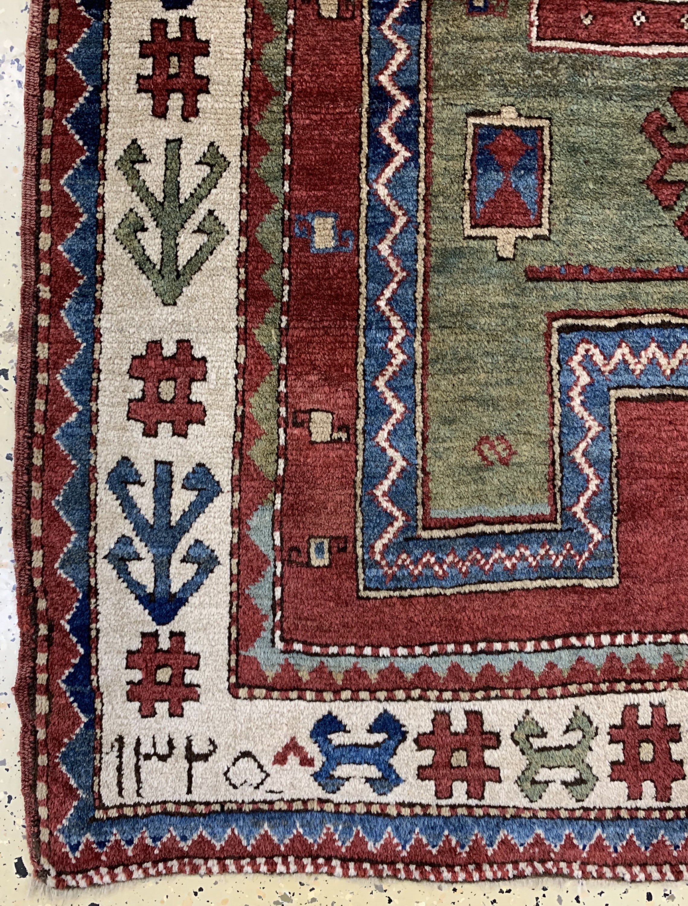 Detail b: "Fachalo"Kazak antik, Kaukasus, datiert 1325(1904), Wolle auf Wolle, ca. 147 x 123 cm,EHZ: 1-2