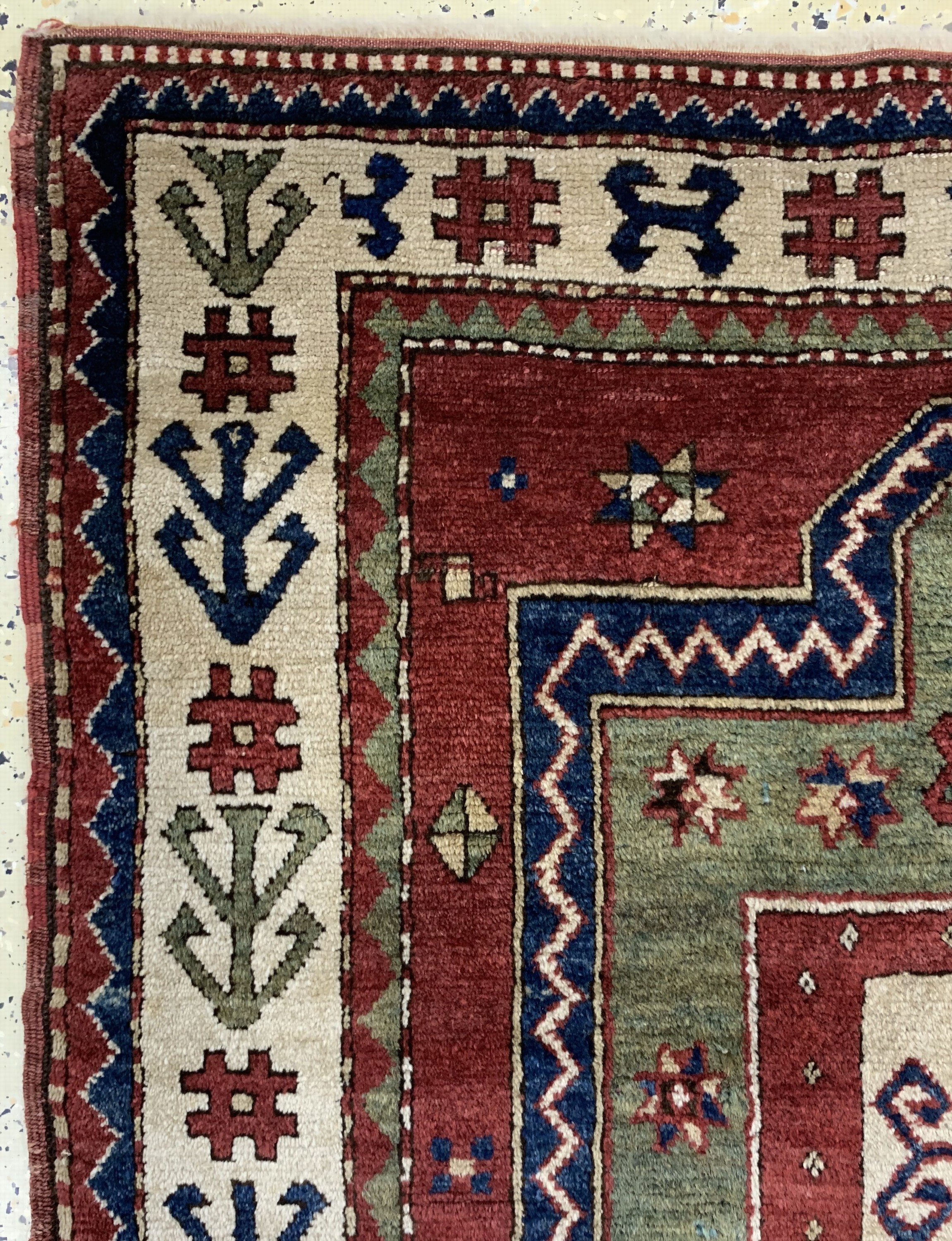 Detail d: "Fachalo"Kazak antik, Kaukasus, datiert 1325(1904), Wolle auf Wolle, ca. 147 x 123 cm,EHZ: 1-2