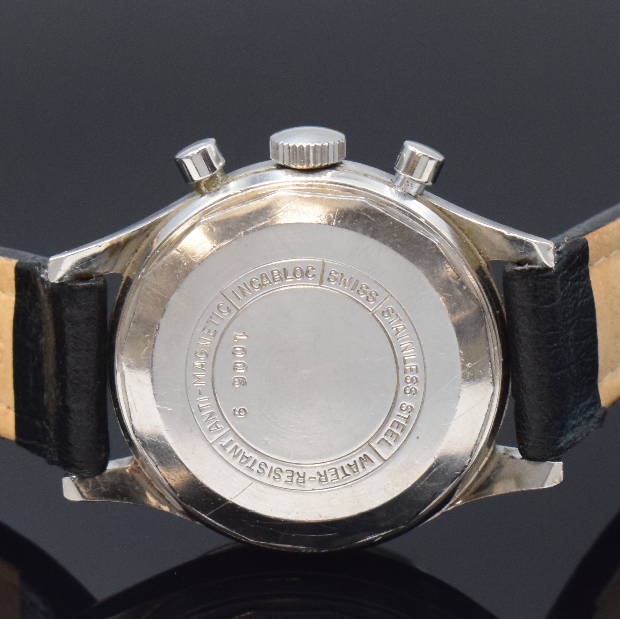Detail c: KSTER Herrenchronograph in Stahl, Schweiz um 1960, Handaufzug, Boden verschr., silb. Zifferbl. m. silb. Std.-Ind., Leuchtzeiger, 30 Min.-Zähler, kl. ...