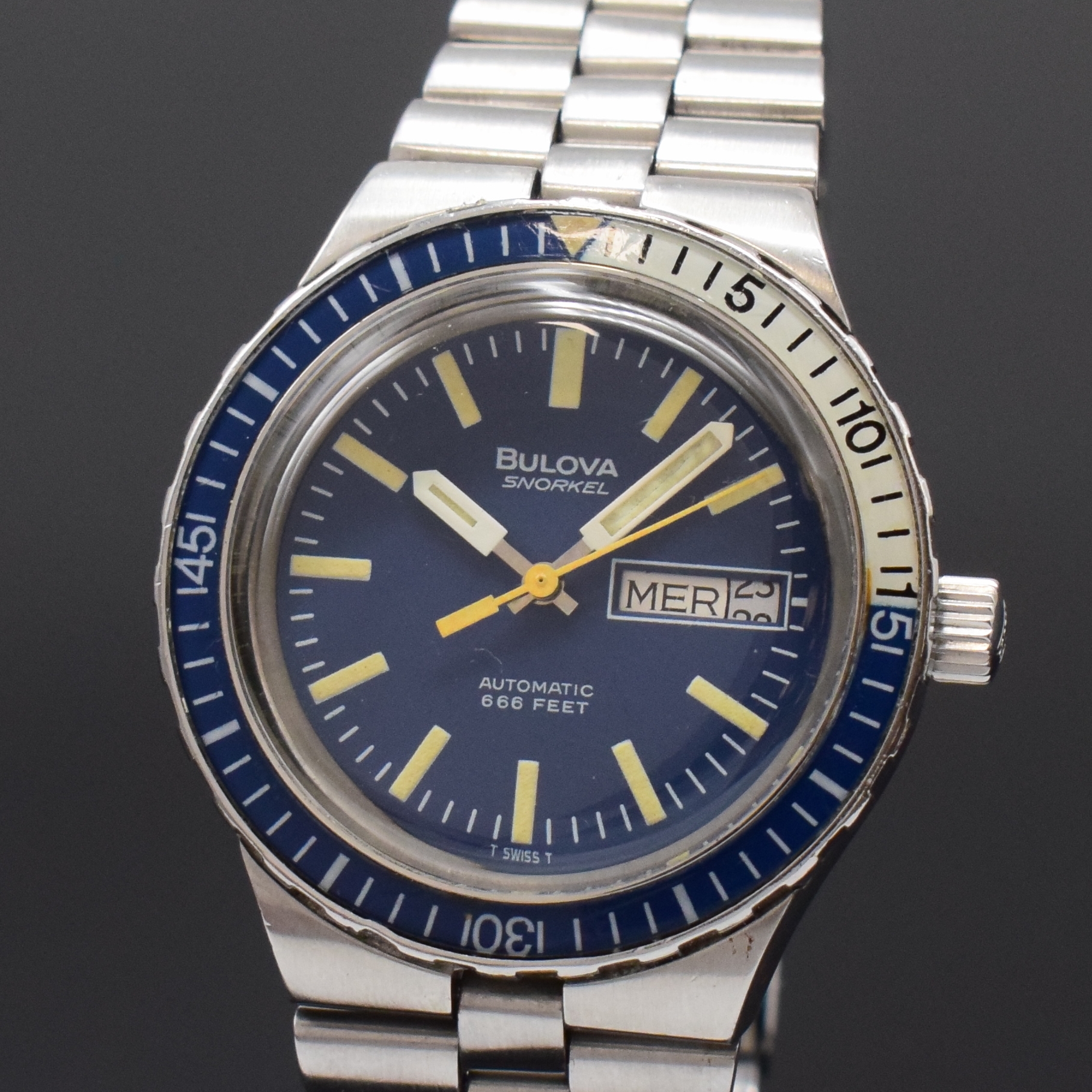 Detail a: BULOVA Snorkel Herrenarmbanduhr in stahl, Schweiz um 1970, Automatik, orig. Gliederband m. Faltschl., Boden verschr., Lünette m. 60er Teilung beids. ...