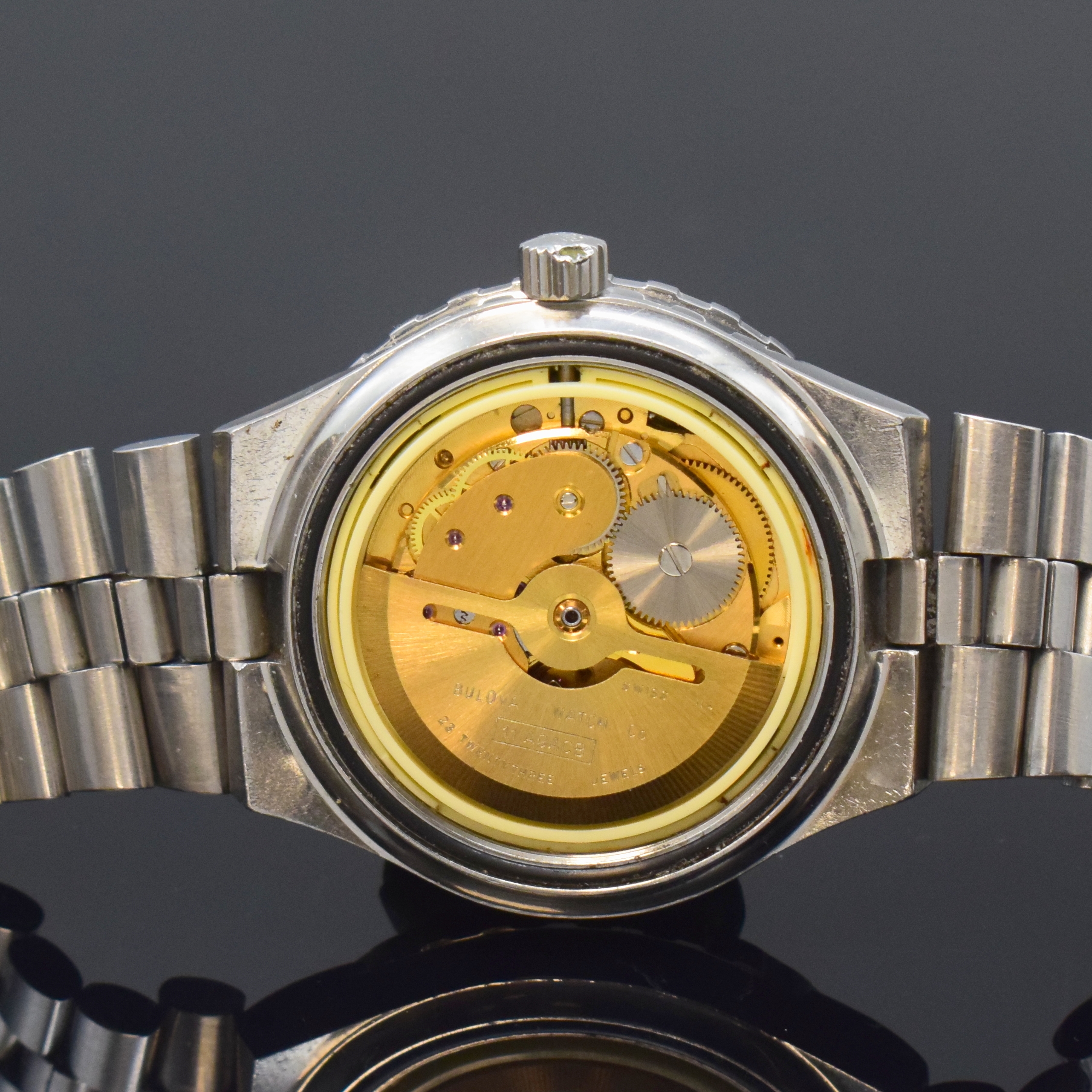 Detail e: BULOVA Snorkel Herrenarmbanduhr in stahl, Schweiz um 1970, Automatik, orig. Gliederband m. Faltschl., Boden verschr., Lünette m. 60er Teilung beids. ...