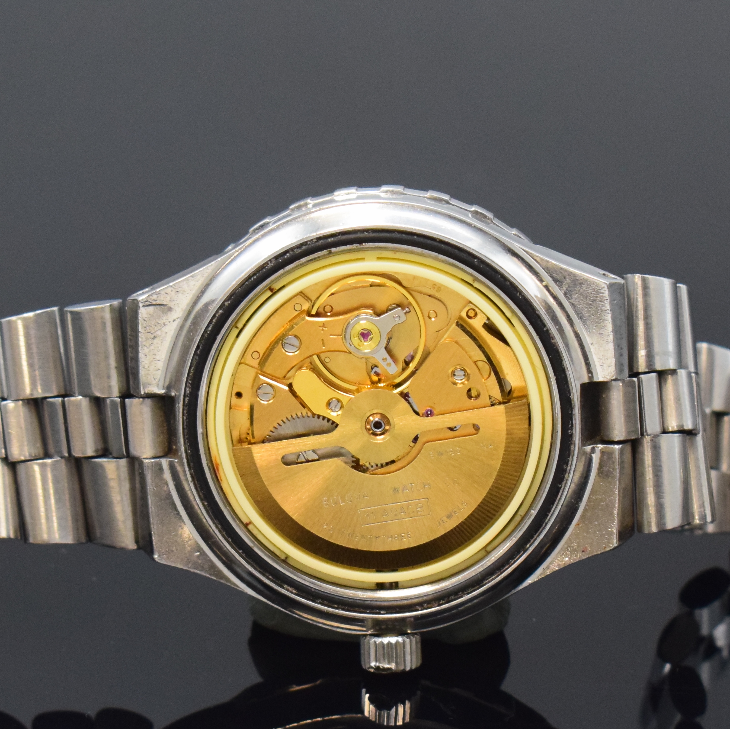 Detail f: BULOVA Snorkel Herrenarmbanduhr in stahl, Schweiz um 1970, Automatik, orig. Gliederband m. Faltschl., Boden verschr., Lünette m. 60er Teilung beids. ...