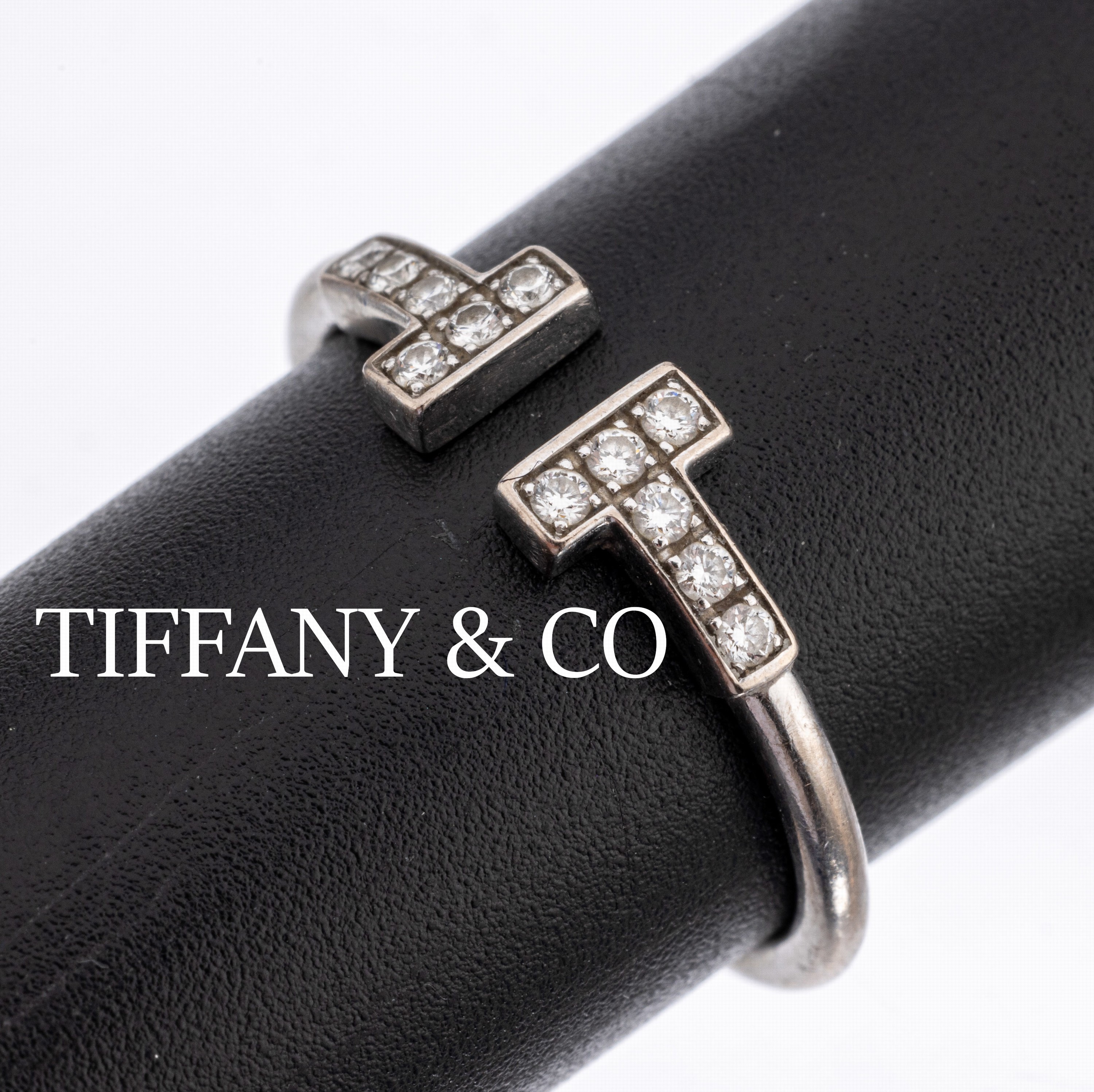 18 kt Gold TIFFANY & Co Brillant Ring, WG 750/000, aus der Serie T-Wire, 2 gegenüber- liegende "T" mit 12 Brillanten zus. ca. 0.12 ct ...