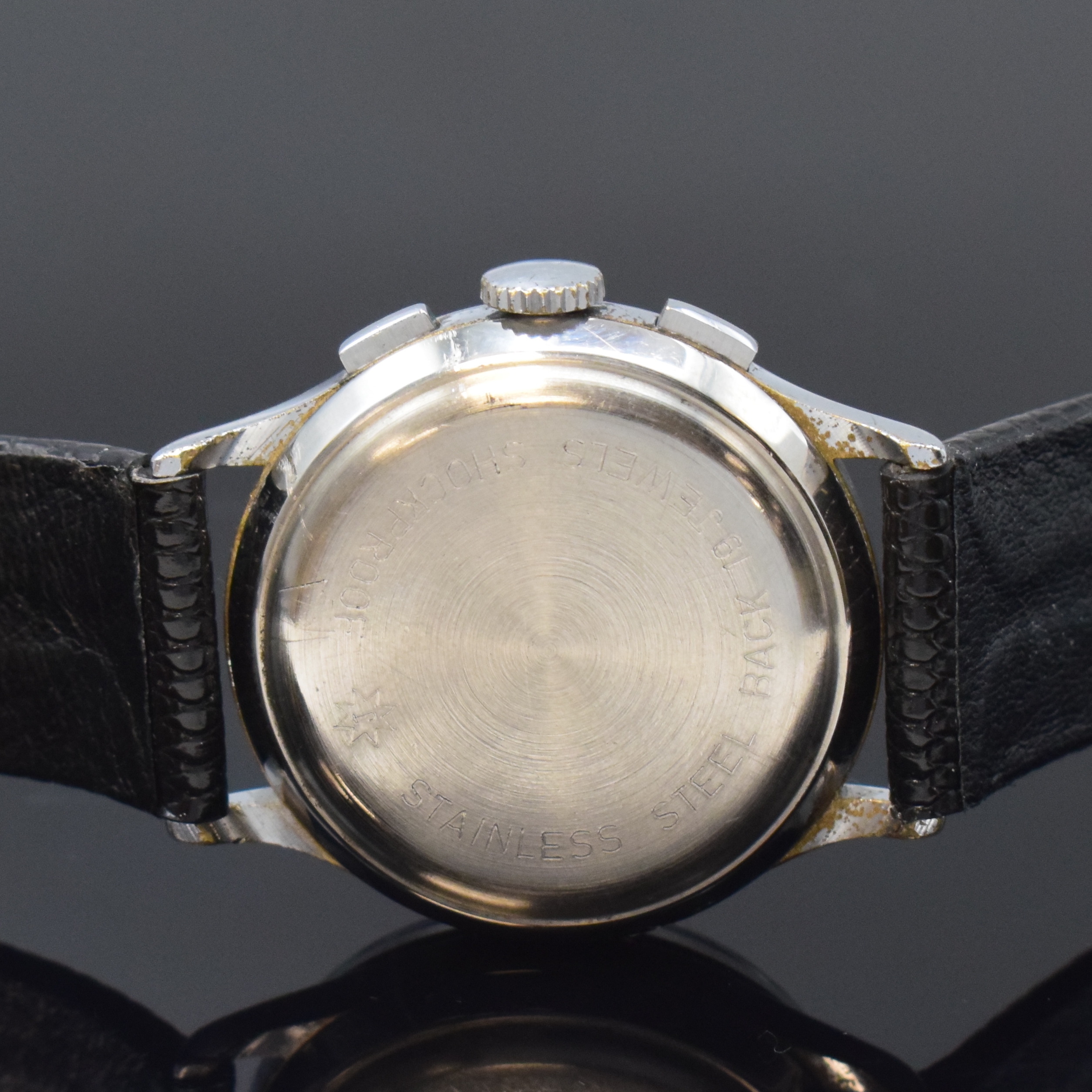 Detail c: JUNGHANS verchromter Schaltradchronograph, Deutschland um 1950, Handaufzug, neutr. Lederband m. Junghans Dornschl., Stahlboden aufgedr., schwarzes ...