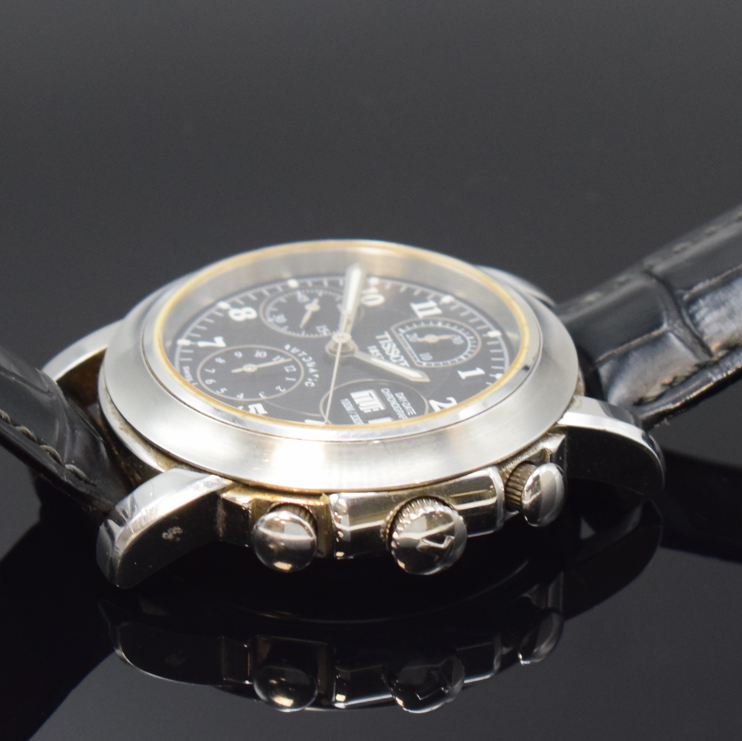 Detail c: TISSOT Armbandchronograph in Stahl, Schweiz um 2000, Automatik, beids. vergl. Geh., Boden aufgedr., schwarz. Zifferbl. m. strukturiertem Zentrum, ...
