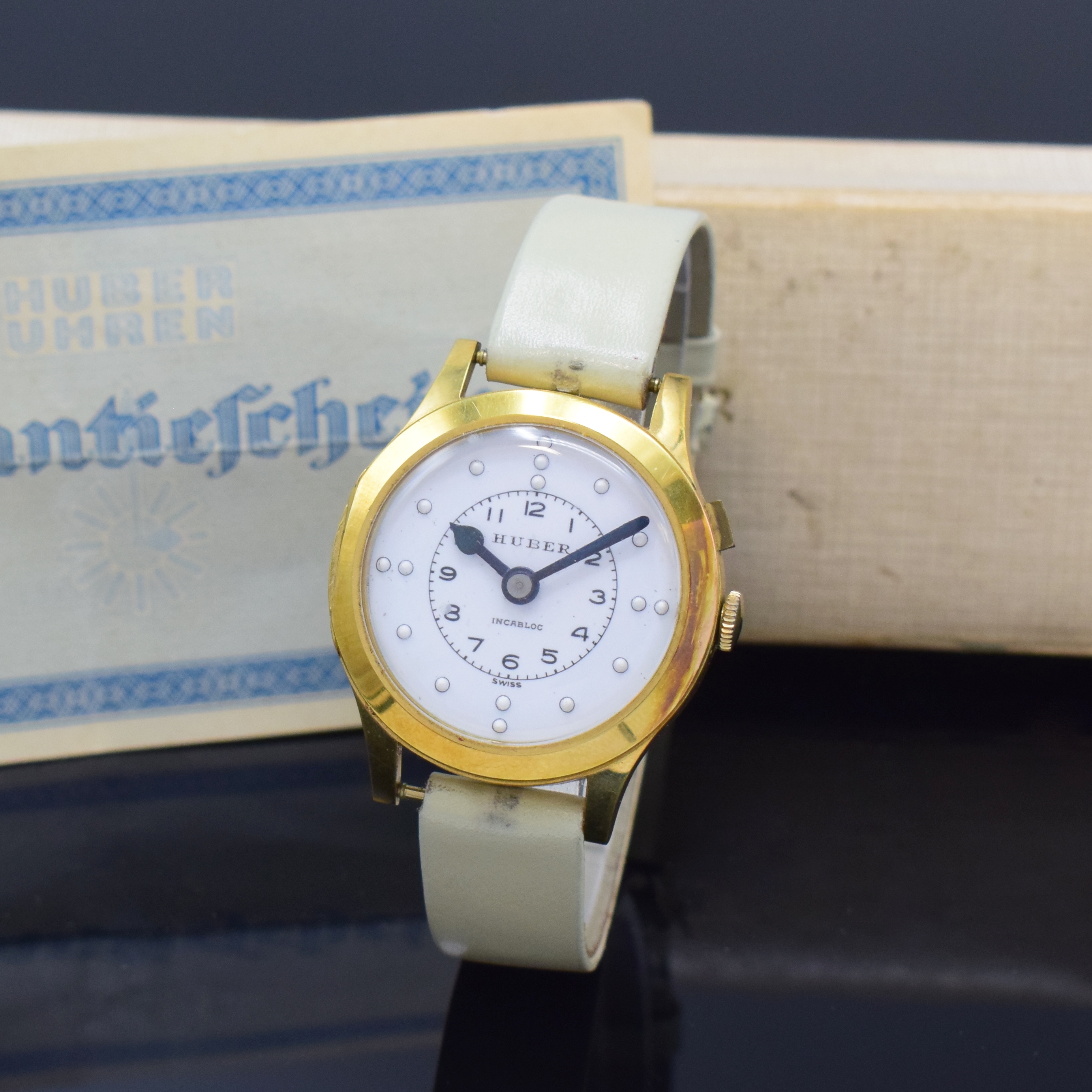 HUBER Blindenuhr mit original Box, Schweiz, Handaufzug, verg. Geh. m. Sprungdeckel- Lünette, Stahlboden aufgedr., Emailzifferbl., arab. Zahlen u. ...