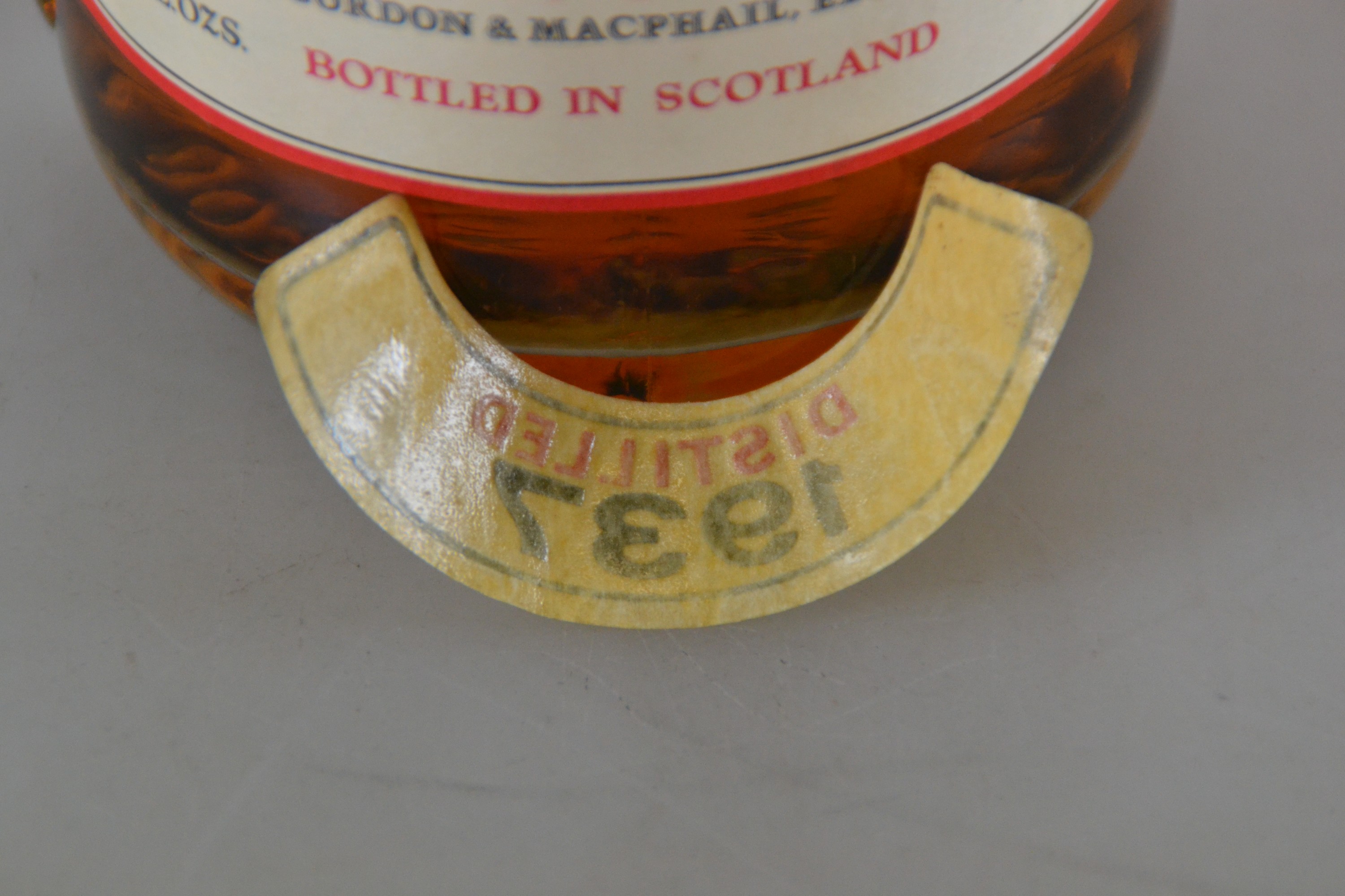 Detail f: 1 Flasche 1937 The Macallan-Glenlivet, Pure Highland Malt Scotch Whiskey, abgefüllt ca. 1977, Abfüller Gordon & MacPhail, Jahresetikett in ...