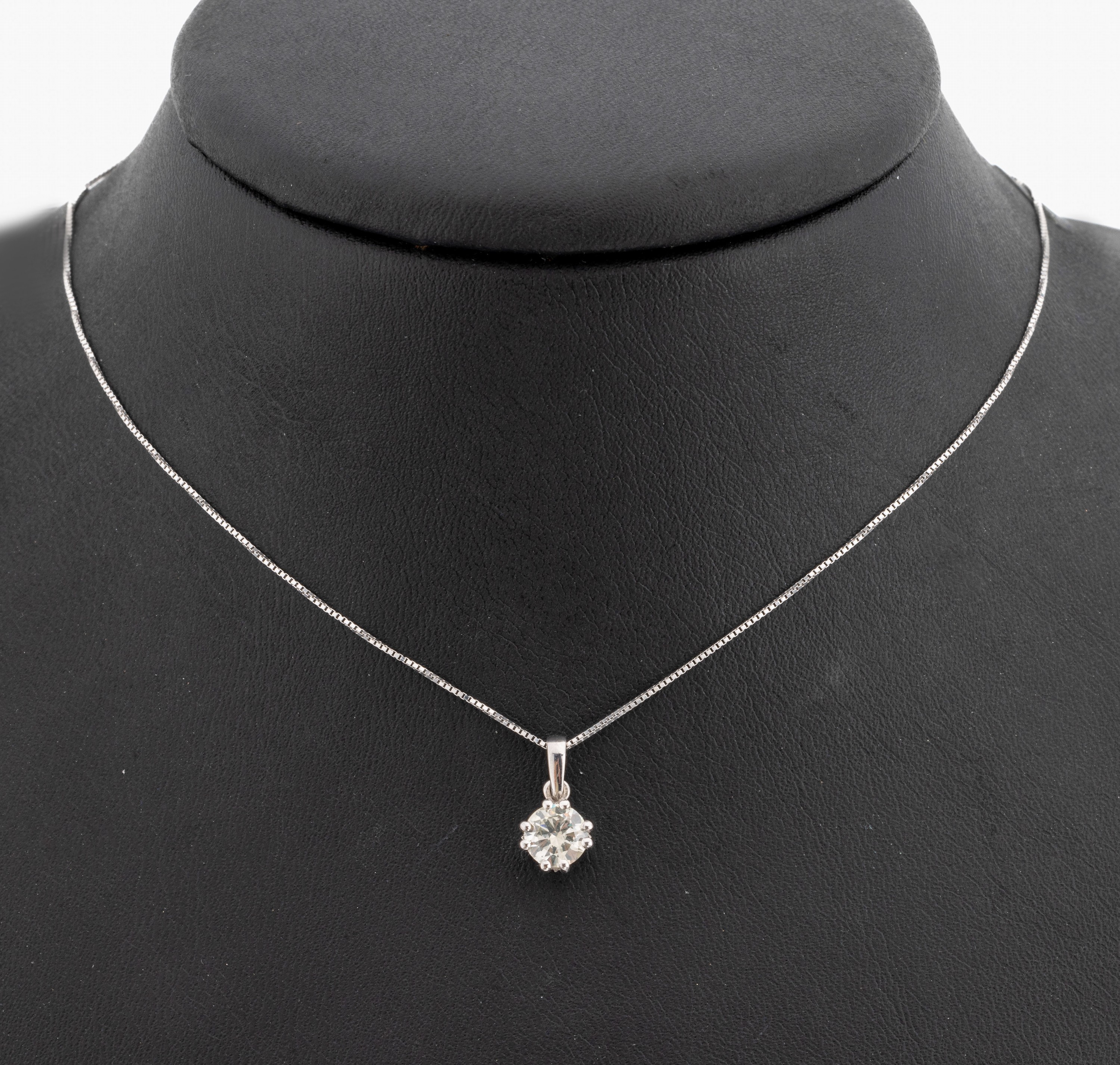 14 kt Gold Brillant-Anhänger, WG 585/000, Brillant ca. 0.71 ct Weiß-l.get.Weiß(H-I)/si2,an Kette, L. ca. 42 cm, Federringschließe, GWLAB ...