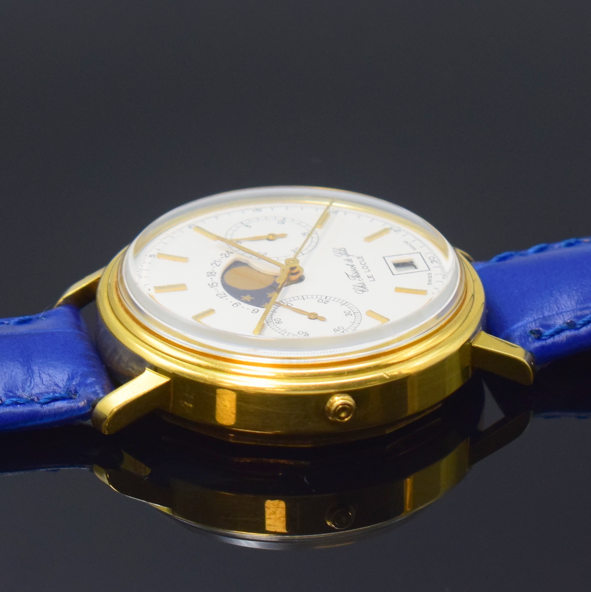 Detail d: TISSOT Le Locle Herrenchronograph mit Mondphase in GG 750/000, Schweiz um 1980, Handaufzug, Boden verschr., Korrekturdr. seitl. im Geh. b. 9, weisses ...