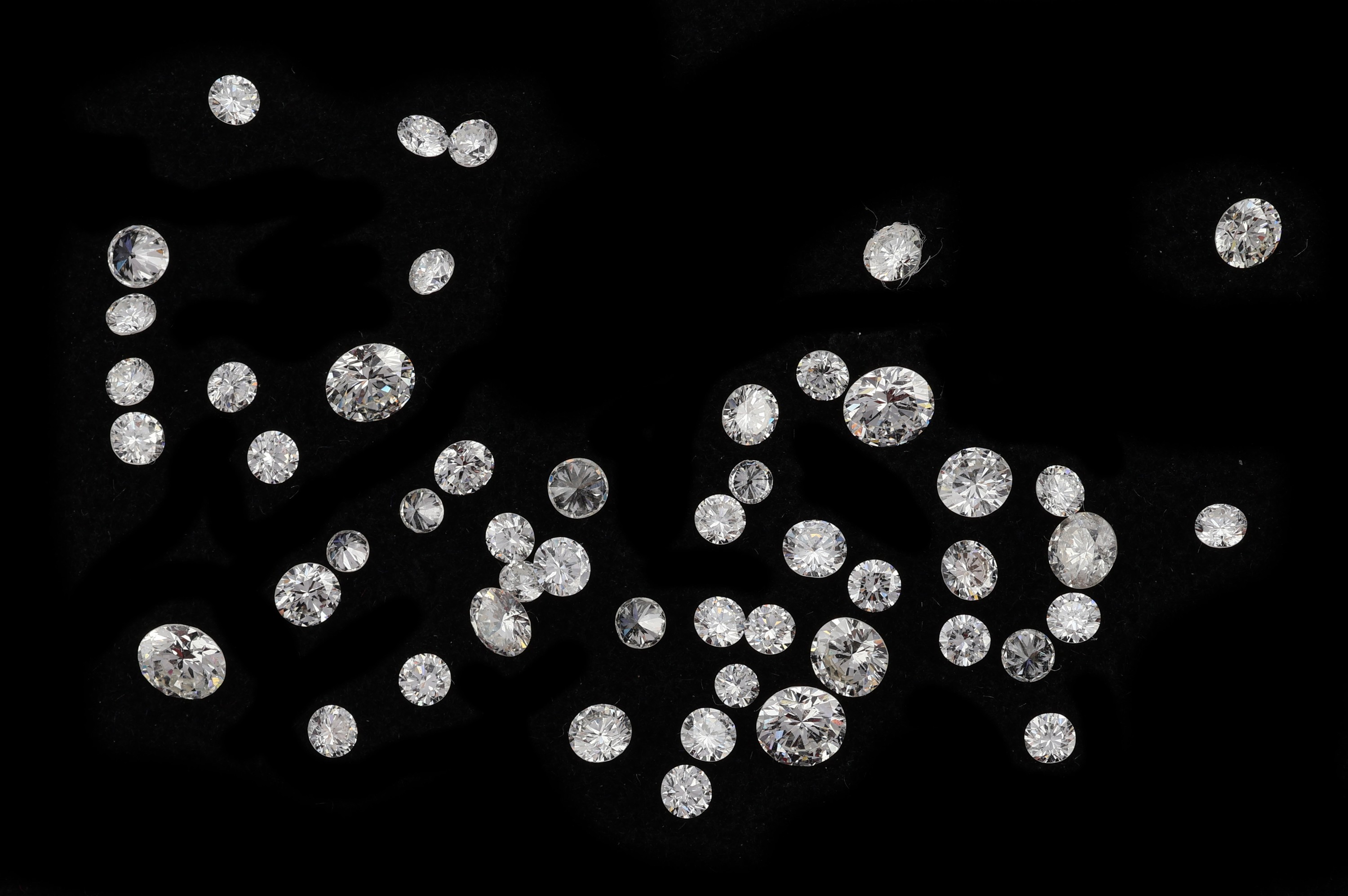 Detail a: Lot lose Brillanten , zus. ca. 3.51 ct feines Weiss-get.Weiss/vs-si, Ausfassware