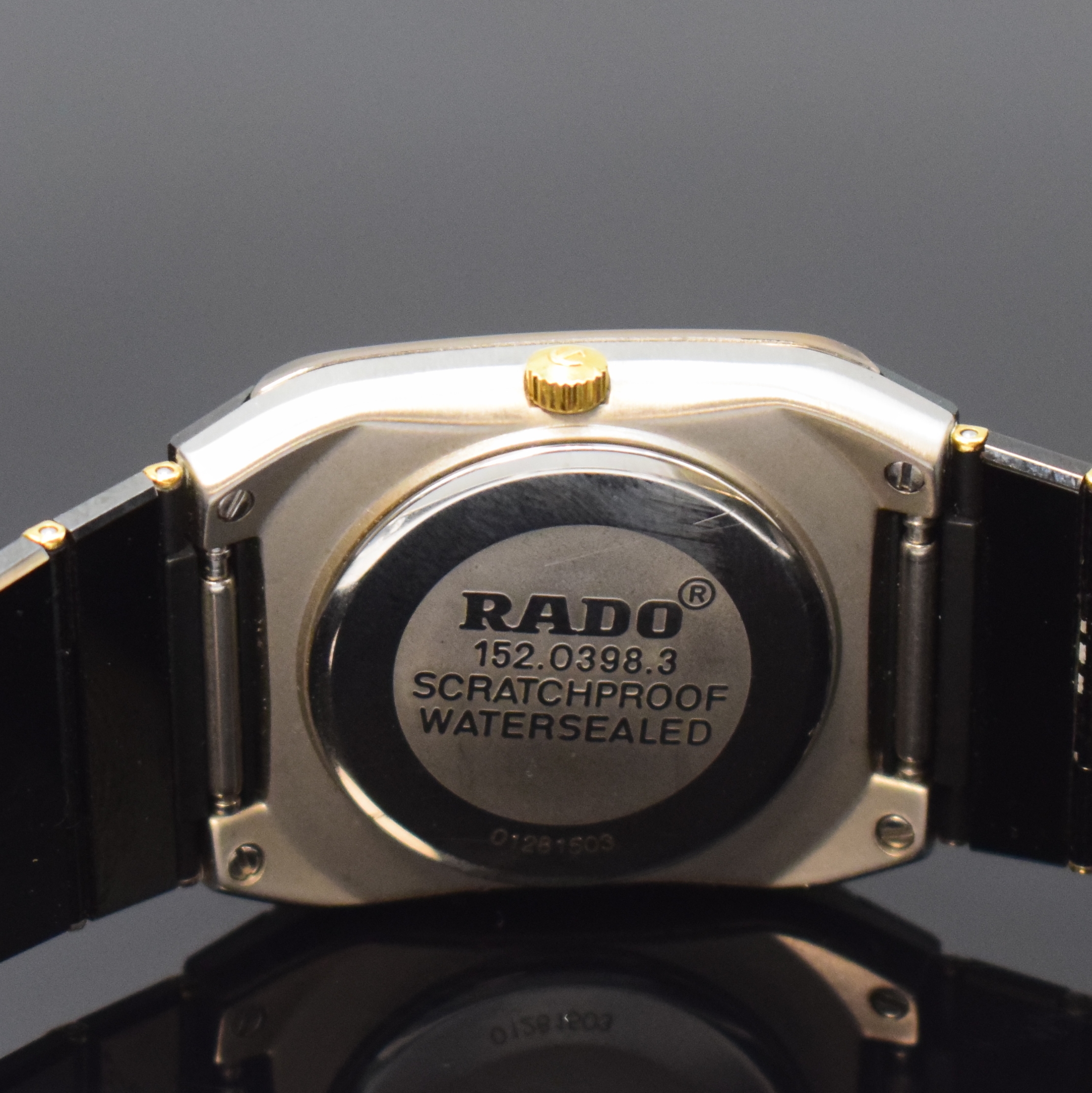 Detail c: RADO Jubile Armbanduhr Referenz 152.0398.3, Schweiz um 1995, quarz, Edelstahlgeh., Boden aufgedr., Keramik-Gliederband z. T. m. Gold verz., dopp. ...