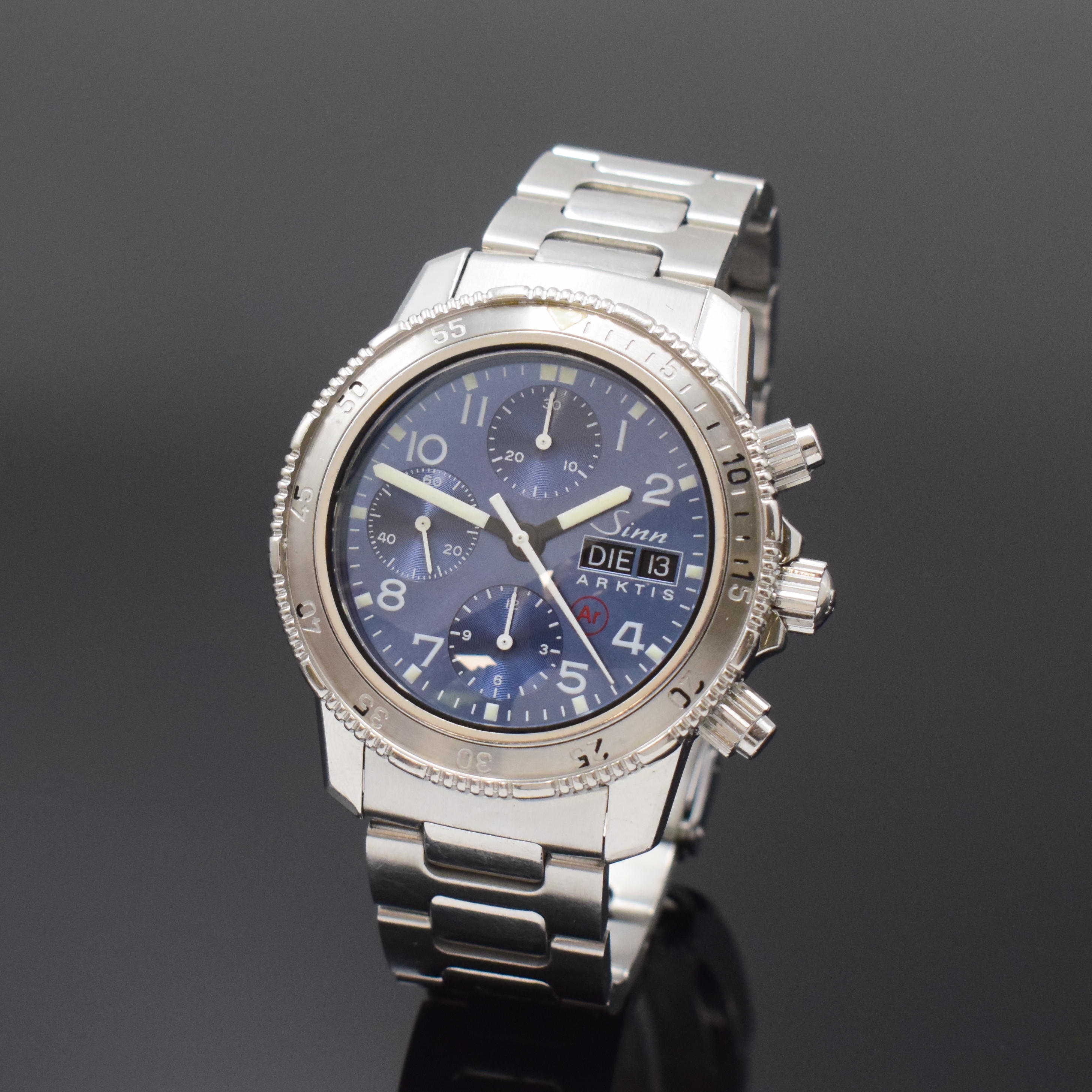 SINN Armbandchronograph Arktis Referenz 203, Schweiz um 1995, Automatik, Edelstahlgeh. inkl. Gliederband m. Faltschl. u. Tauchverlängerung, Boden, ...