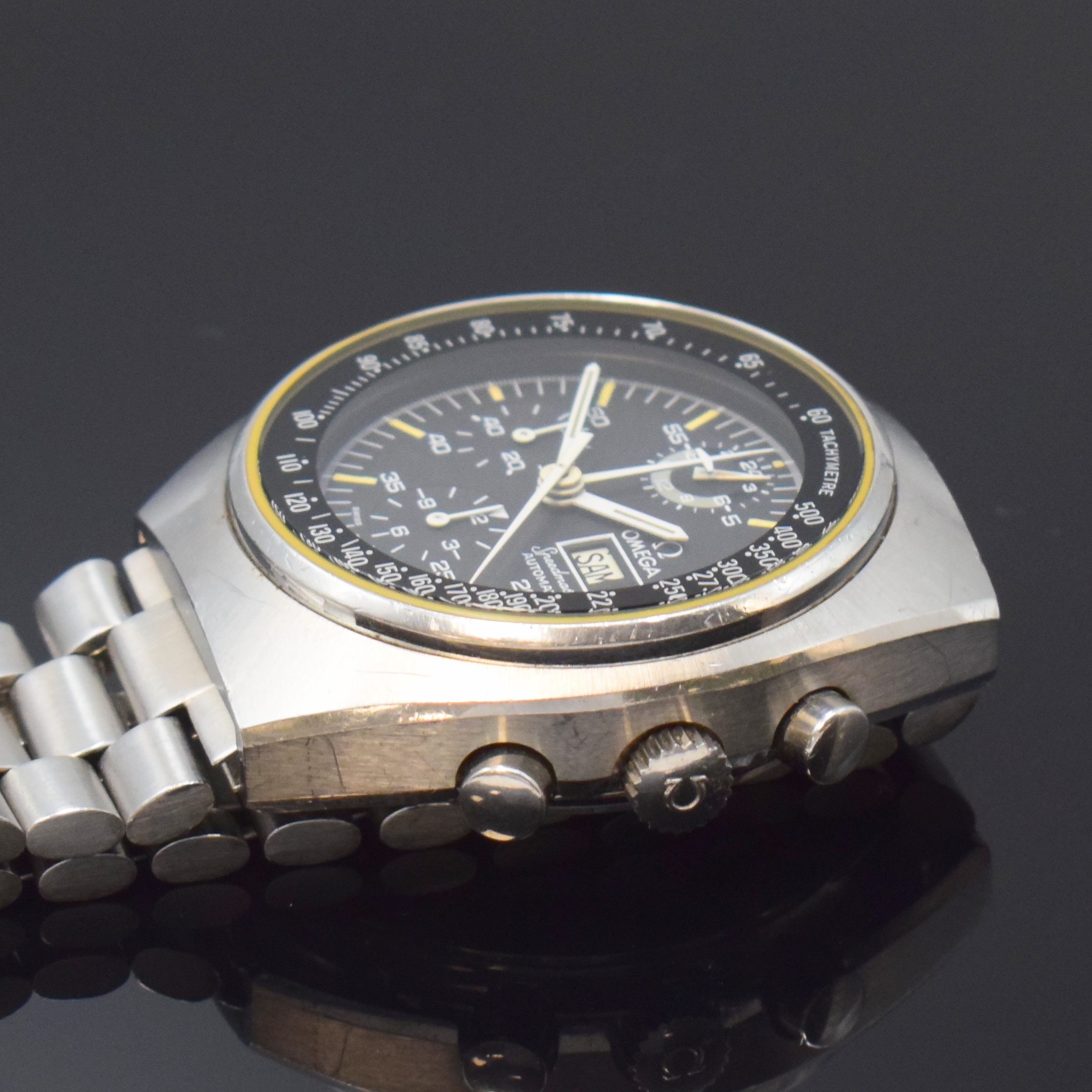 Detail c: OMEGA Speedmaster Armbandchronograph sogenannte Mark 4,5 Referenz 176.0012, Schweiz um 1979, Automatik, verschr. Geh. inkl. orig. Gliederband m. ...