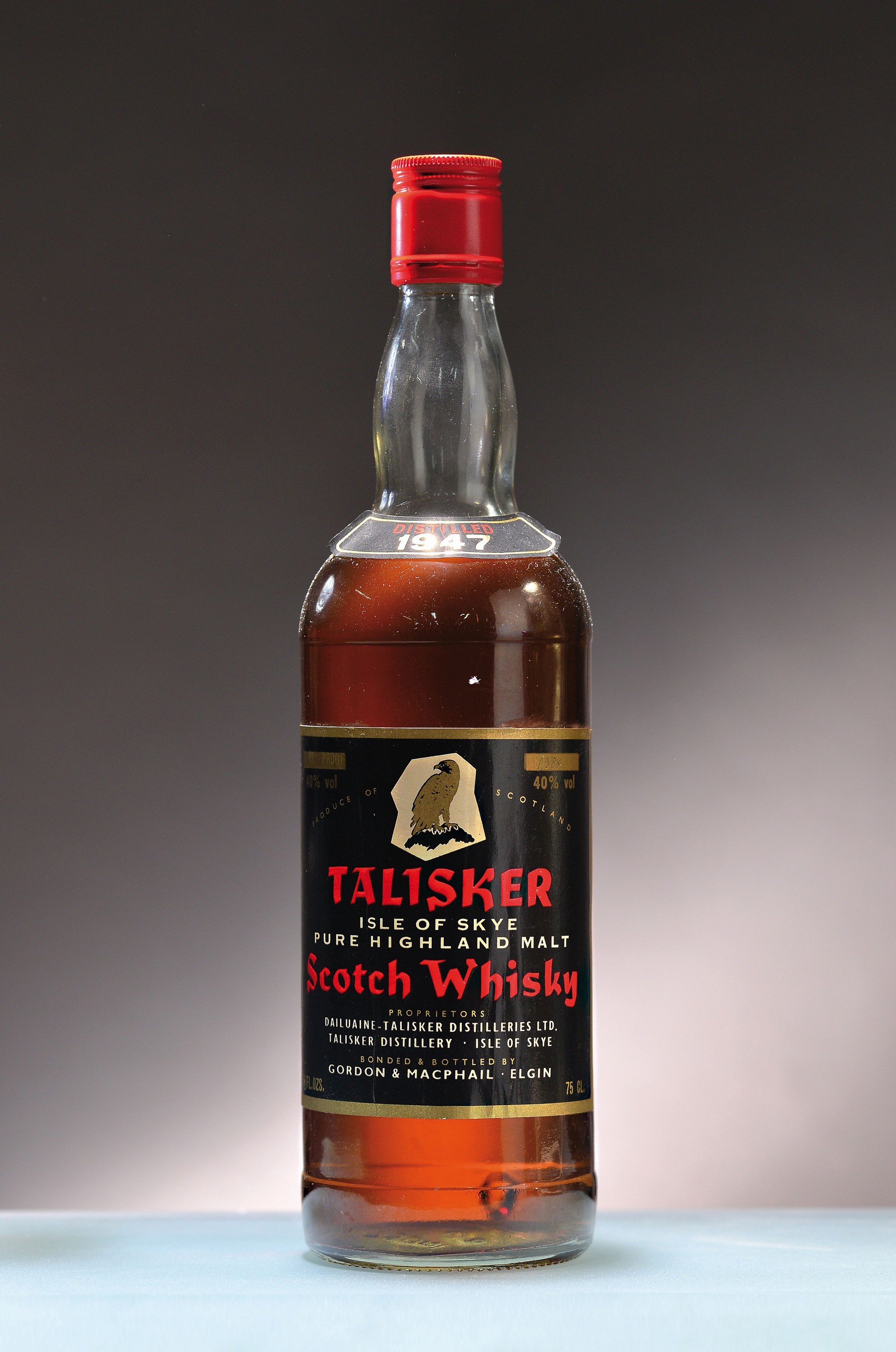 1 Flasche 1947 Talisker, Single Malt, Abfüller Gordon & MacPhail, ca. 75cl, 40&Vol.,Upper mid shoulder, Etikett l. wellig