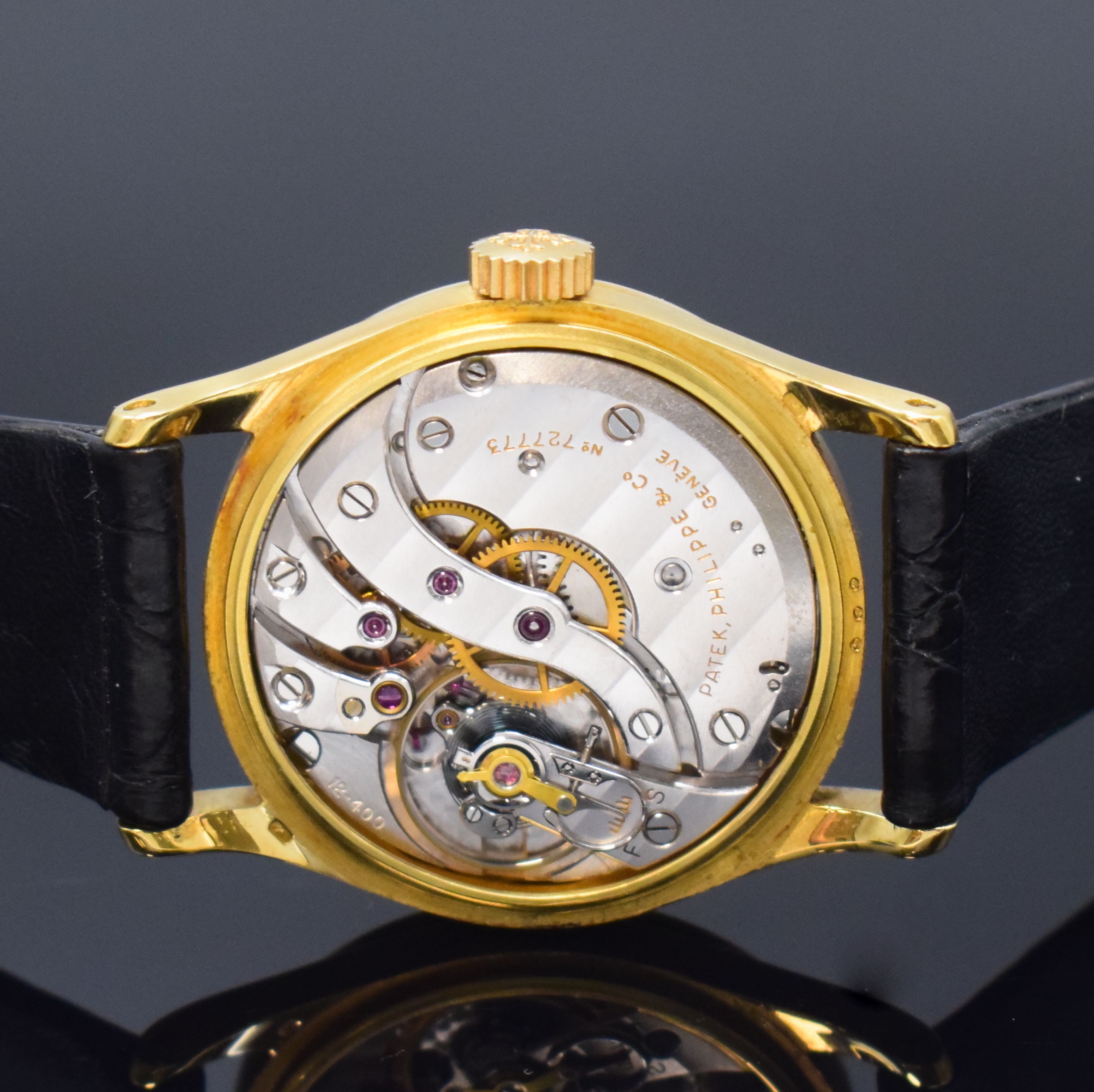 Detail e: PATEK PHILIPPE Calatrava Armbanduhr in GG 750/000 Referenz 96, Schweiz um 1955, Handaufzug, Boden u. Glasrand aufgedr., neutr. Lederband inkl. ...