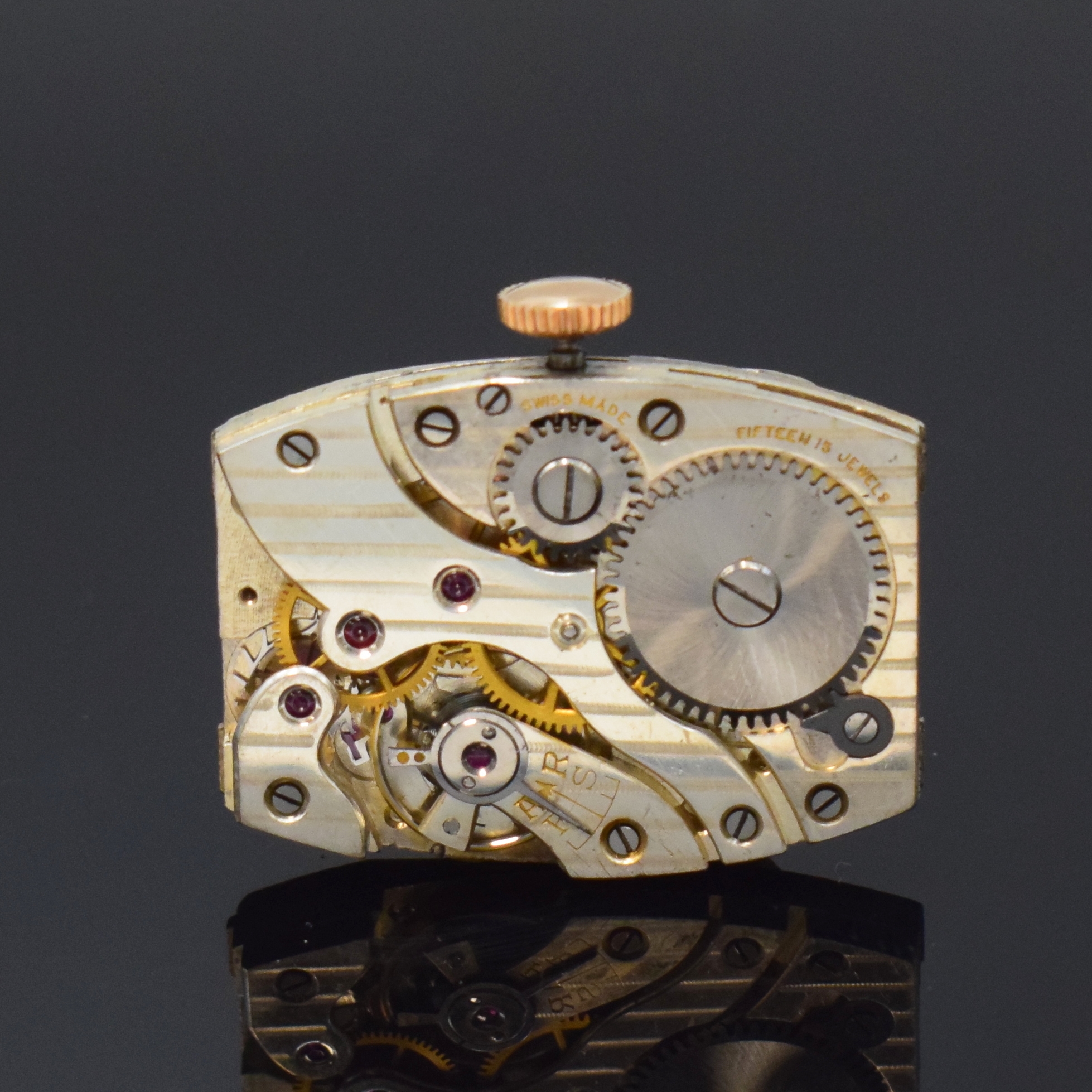 Detail e: Rechteckige Armbanduhr in RoseG 375/000 mit digitaler Anzeige, Schweiz um 1935, Handaufzug, Scharniergeh., digitale Anzeige f. Std., Min. u. kl. ...