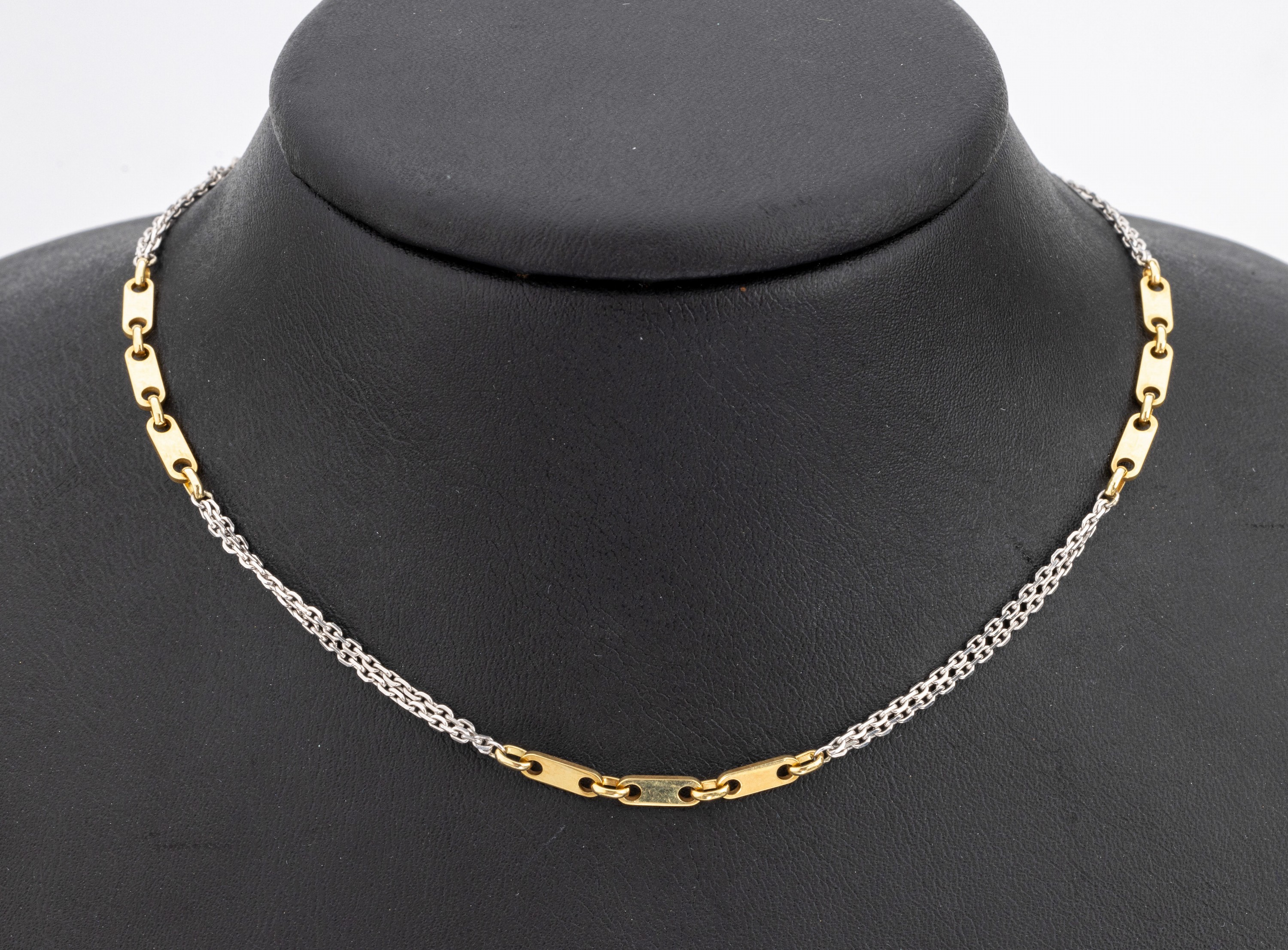 14 kt Gold Collier, WG/GG 585/000, 2-rhg. WG, GG Zwischenglieder, L. ca. 42 cm, ca. 7.3 g, Karabinerschliesse