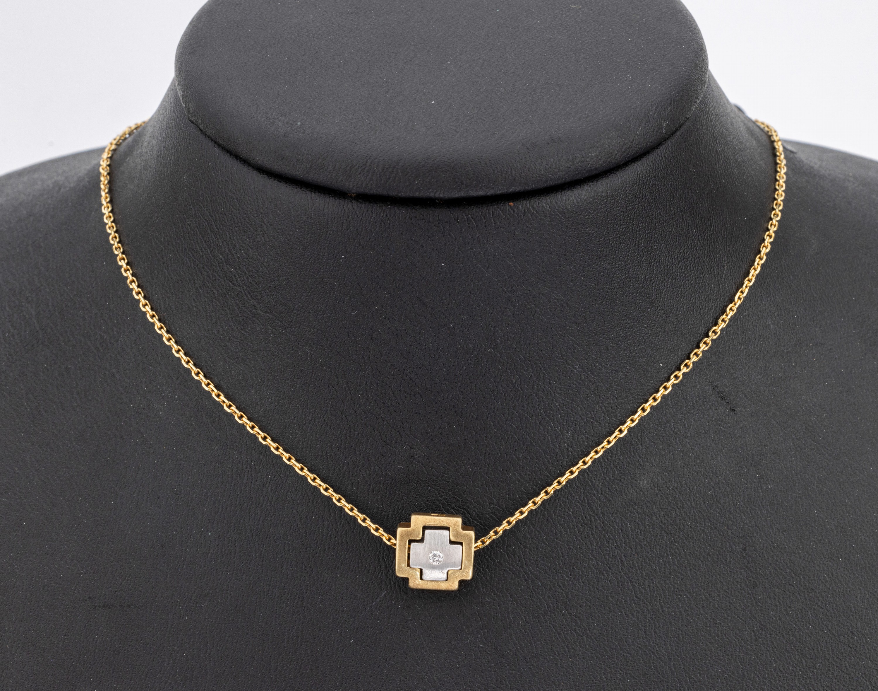 14 kt Gold Brillant-Anhänger, GG/WG 585/000, 1 in WG gefasster Brillant ca. 0.03 ct Weiß/si, an Kette, GG 585/000, L. ca. 45 cm, ...